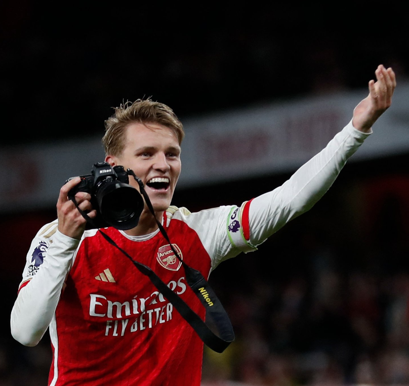 Arsenal captain Martin Odegaard celebrates after the win over Liverpool.