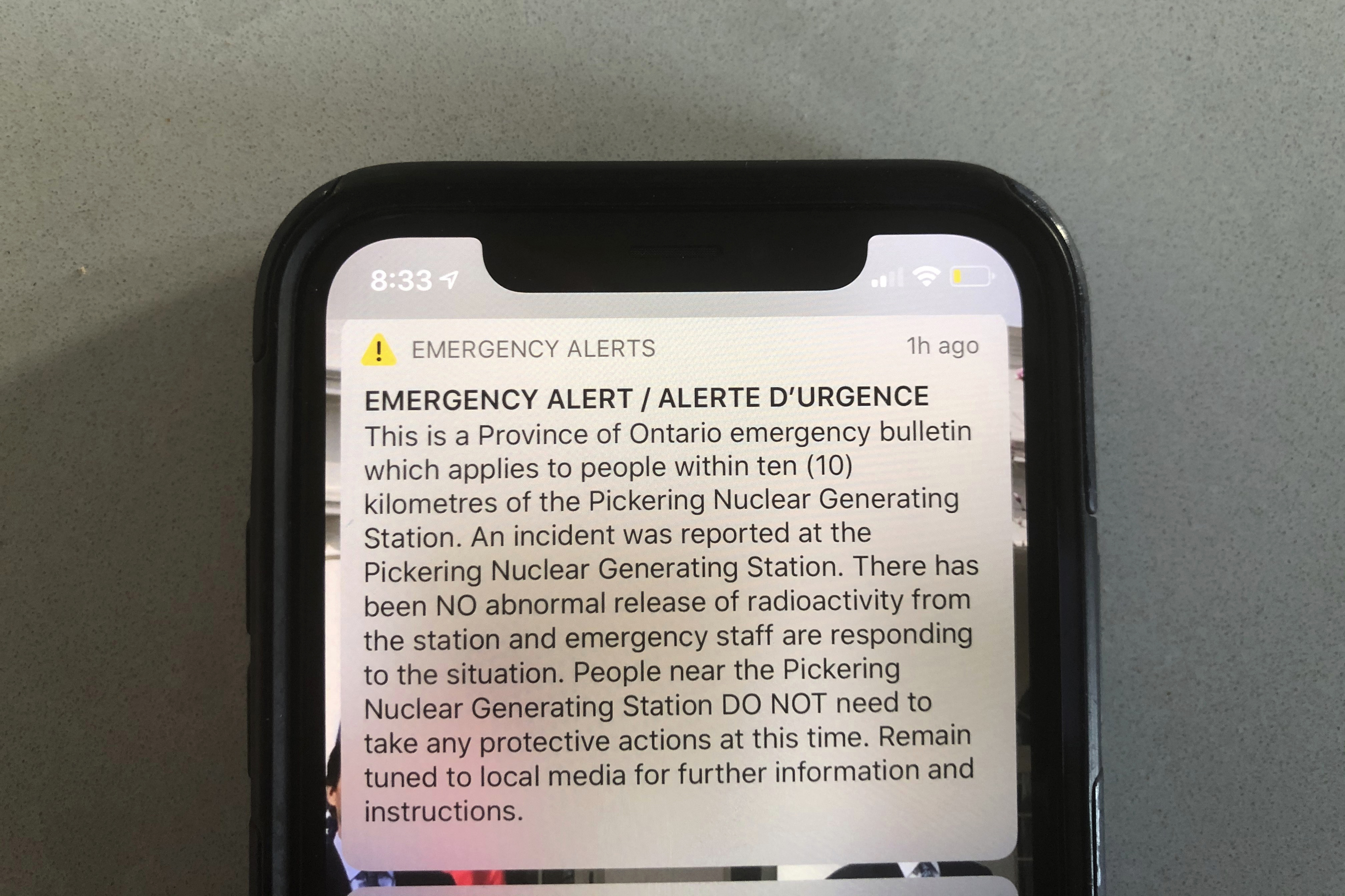 An emergency alert issued by the Canadian province of Ontario reporting an unspecified "incident" at a nuclear plant is shown on a smartphone. Ontario Power Generation later sent a message saying the alert was sent in error. The initial message said the incident had occurred at the Pickering Nuclear Generating Station, though it added there had been no abnormal release of radioactivity from the station.