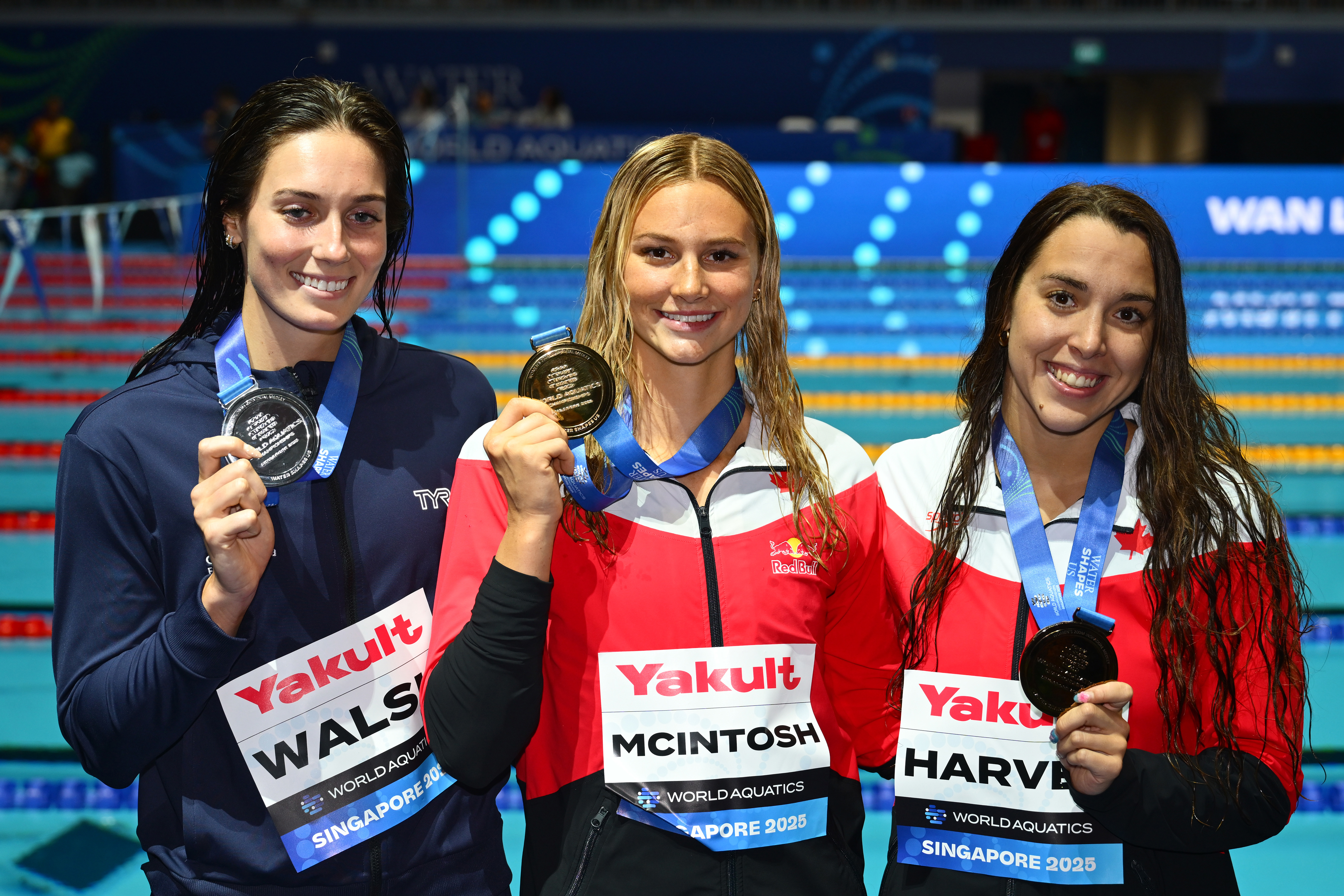 From left to right: Silver medallist Alex Walsh, gold medallist Summer McIntosh and bronze medallist Mary-Sophie Harvey.