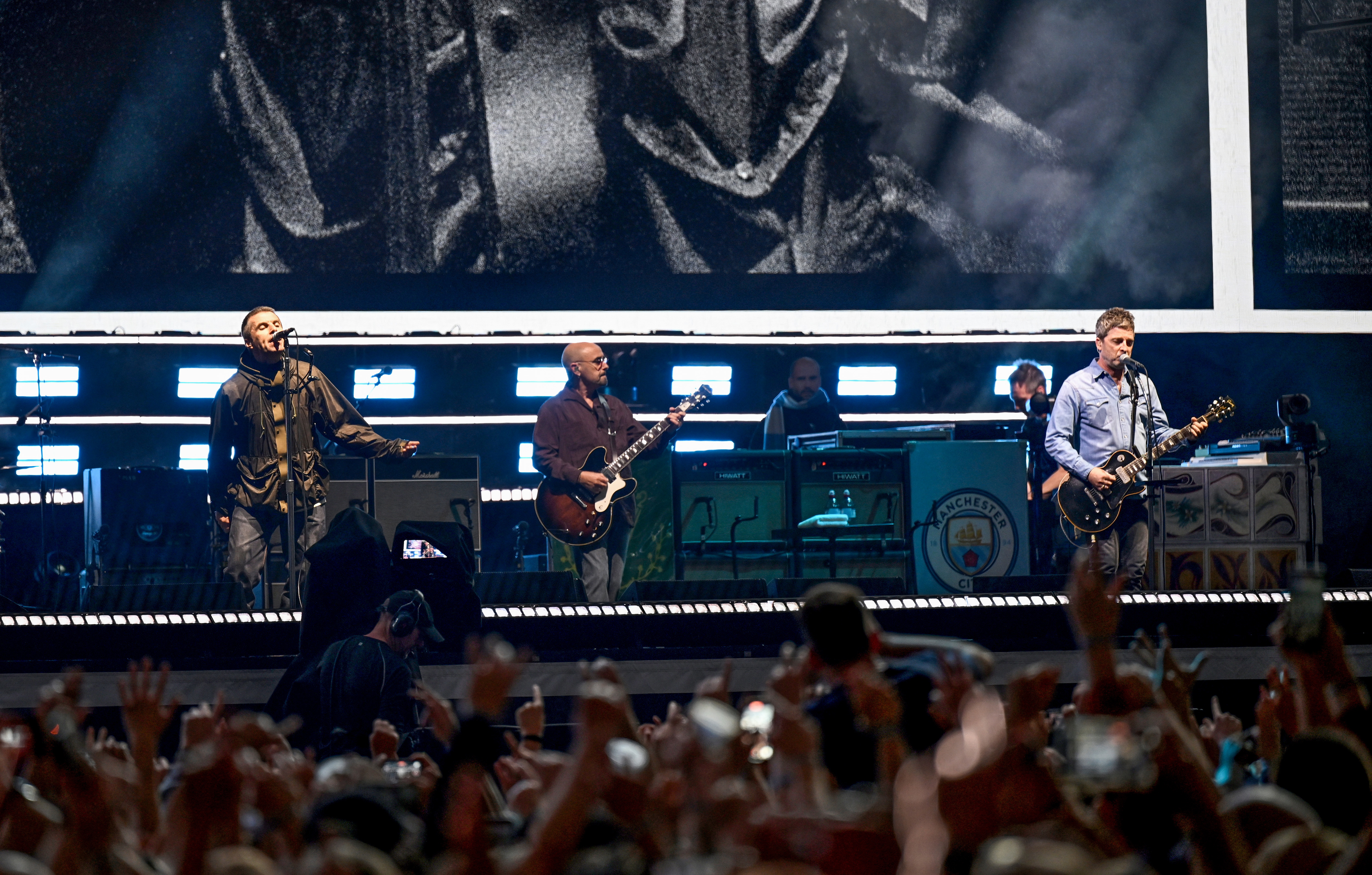 Oasis first reunion concert in Cardiff, Liam Gallagher and Noel Gallagher