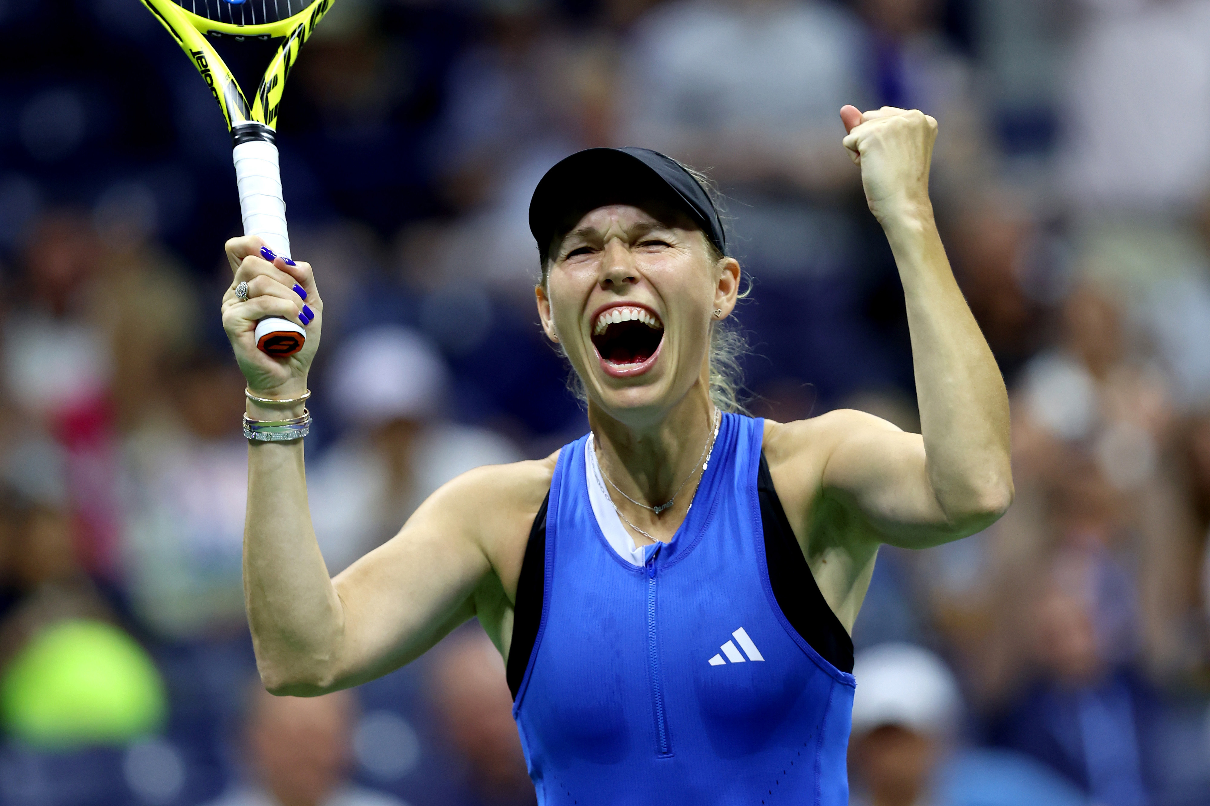 Caroline Wozniacki of Denmark celebrates match point against Petra Kvitova of the Czech Republic.