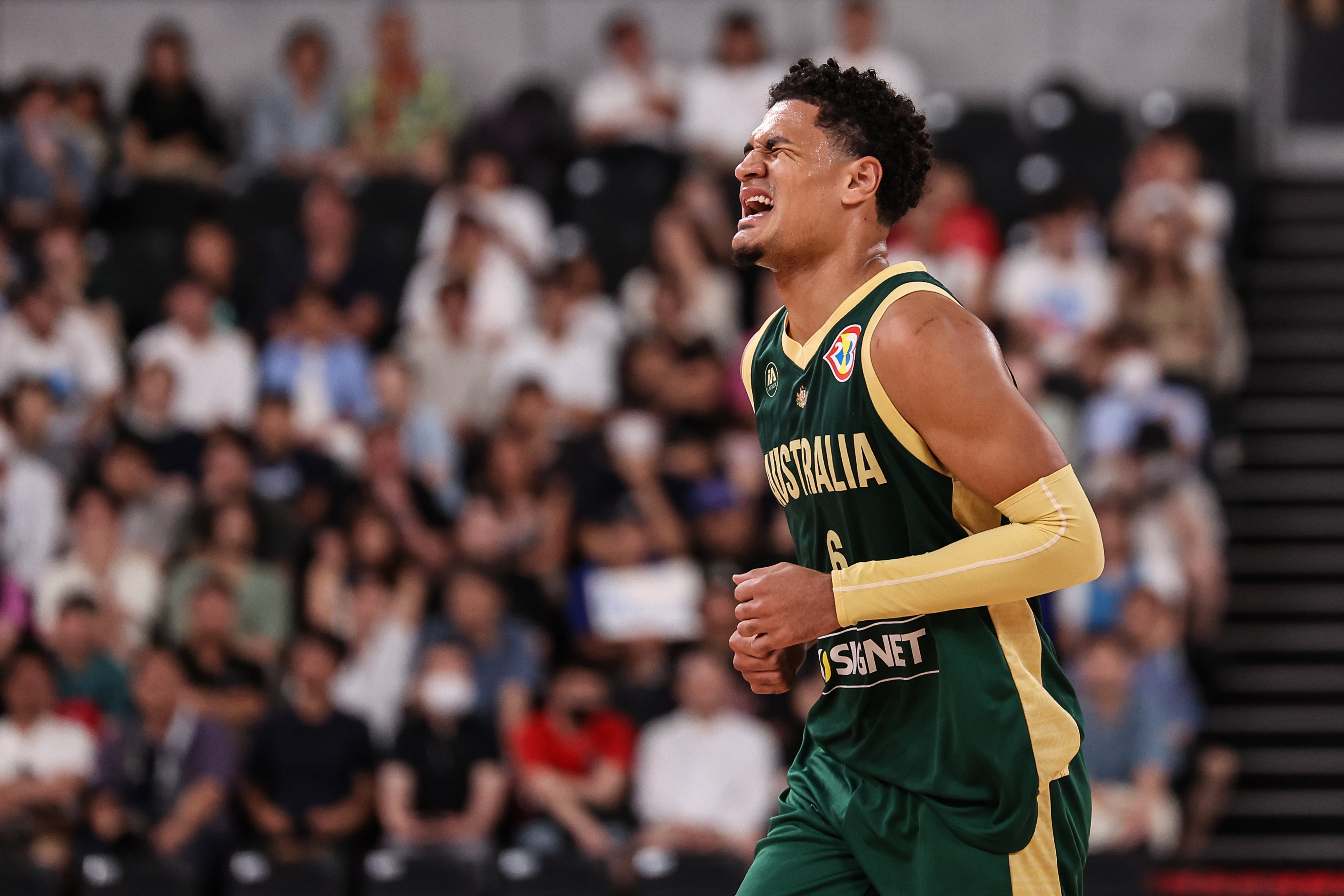 Josh Green limps off injured during the Boombers' exhibition match against France.