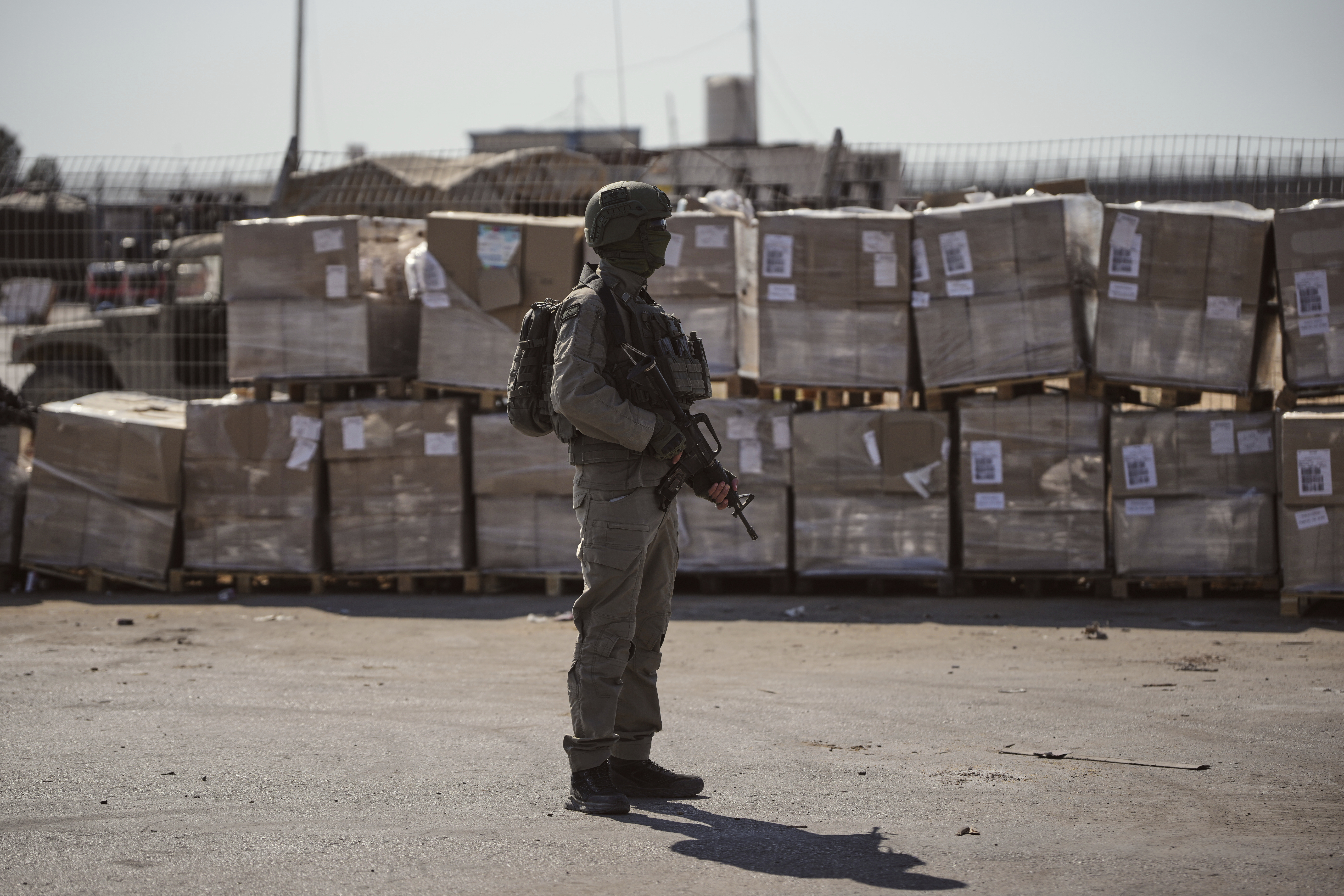 Israel says truckloads of aid waiting to enter Gaza. Why can't they bring them in?