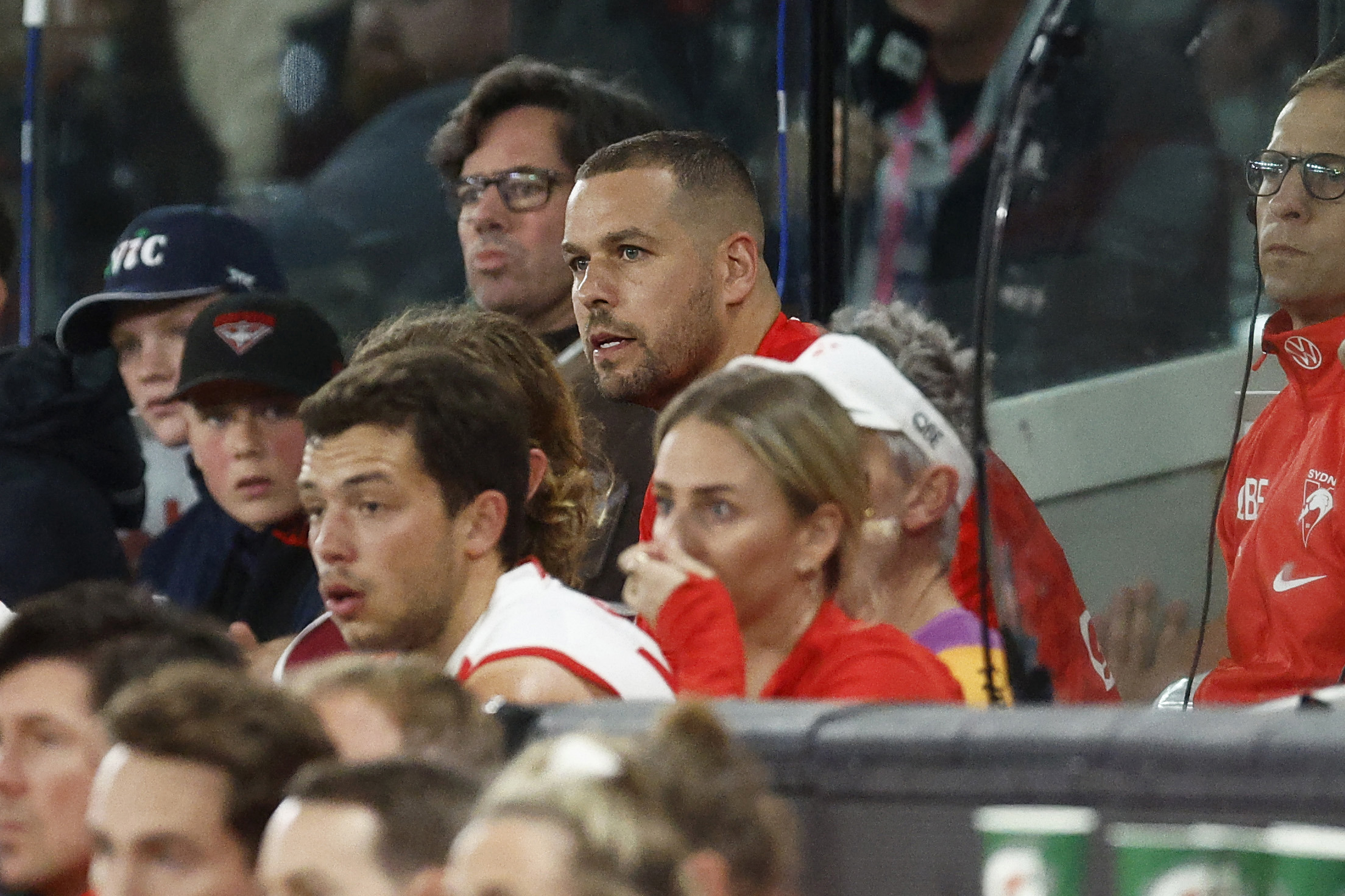 MELBOURNE, AUSTRALIA - JULY 29: Lance Franklin of the Swans (C) is seen siting on the interchange bench after being subbed out of the game during the round 20 AFL match between Essendon Bombers and Sydney Swans at Marvel Stadium, on July 29, 2023, in Melbourne, Australia. (Photo by Daniel Pockett/Getty Images)