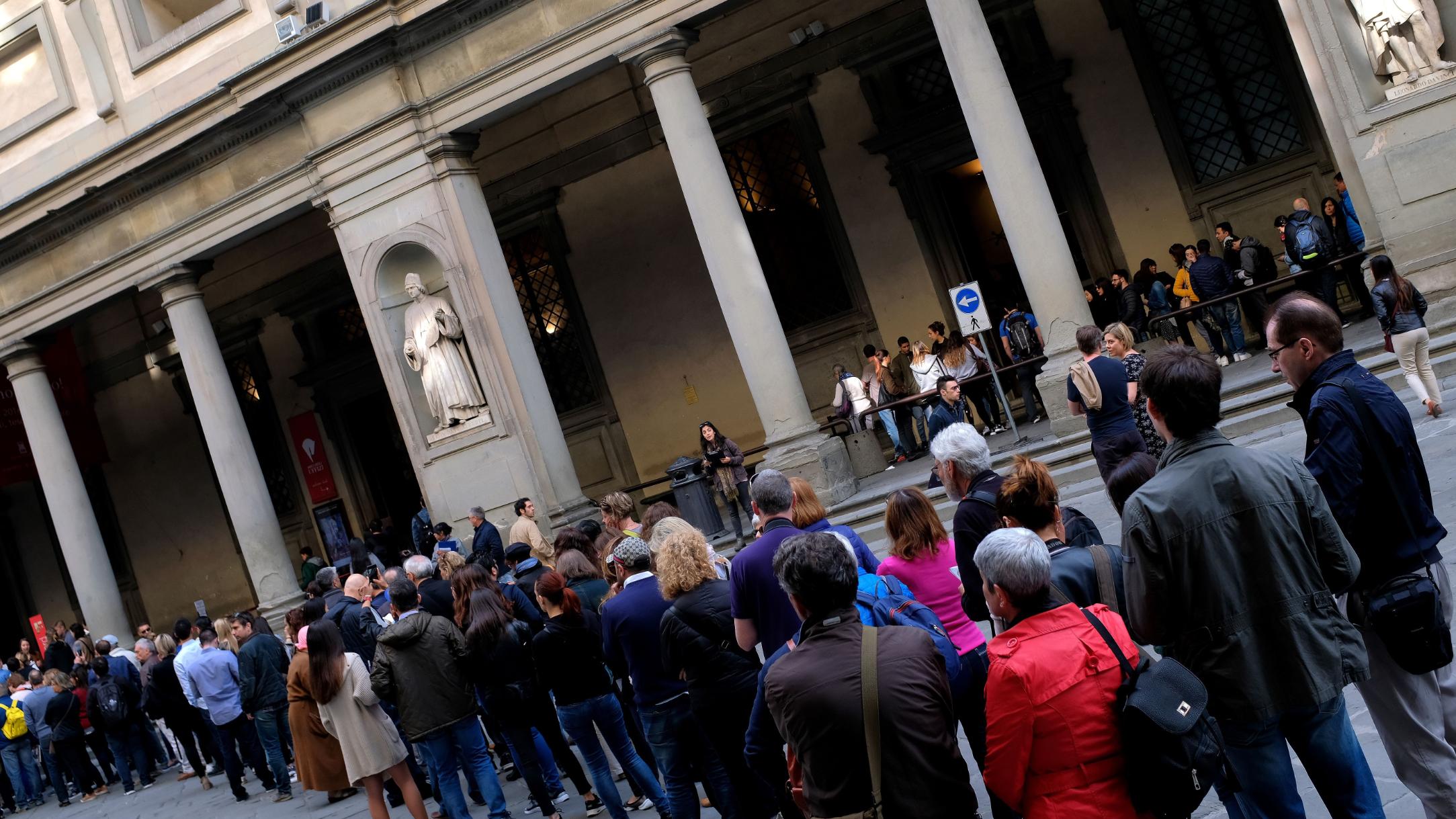  Tourists eating and drinking in the courtyard around the Uffizi are ruining the historic building, says director Eike Schmidt.