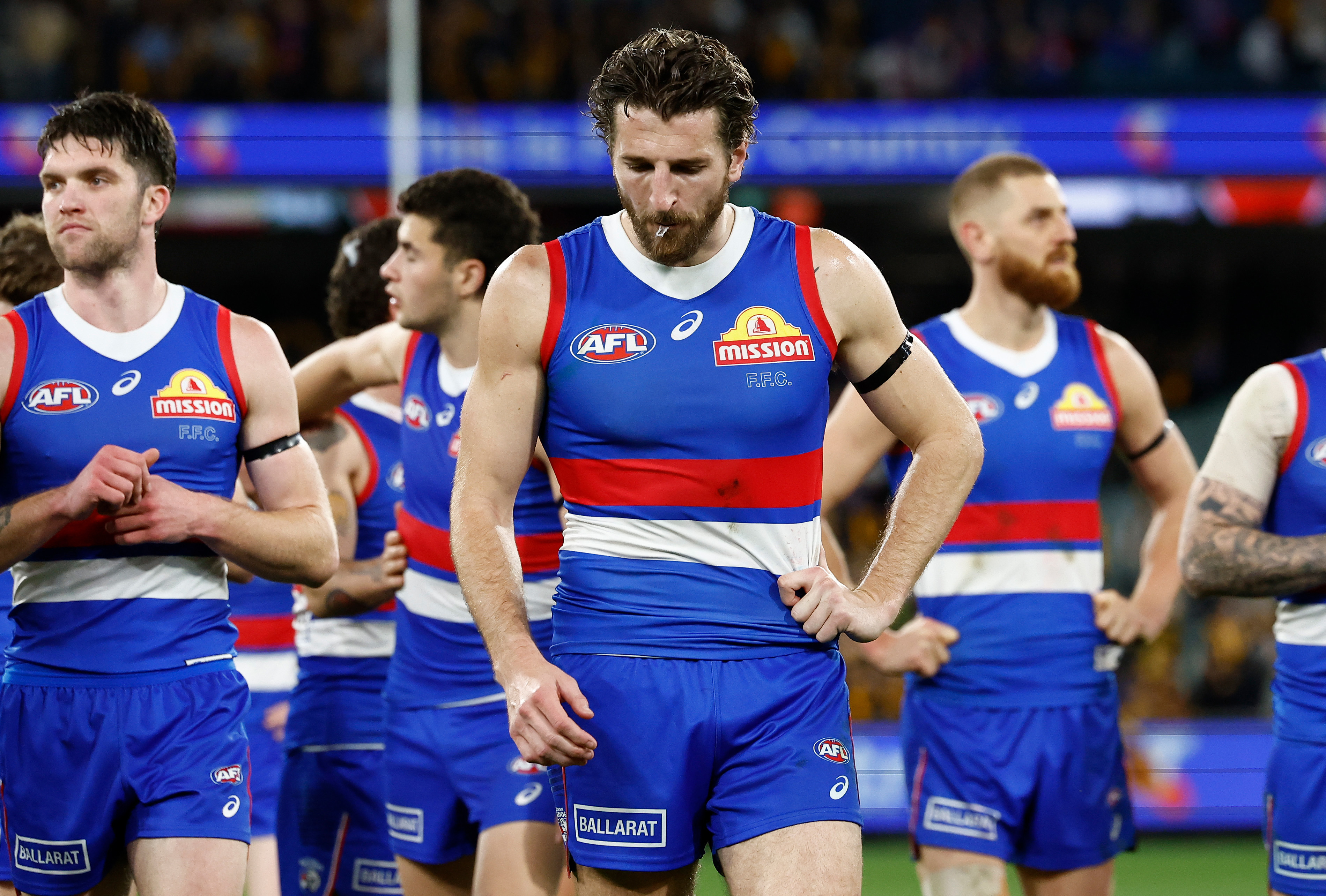 Marcus Bontempelli of the Bulldogs looks dejected after their loss to Hawthorn.