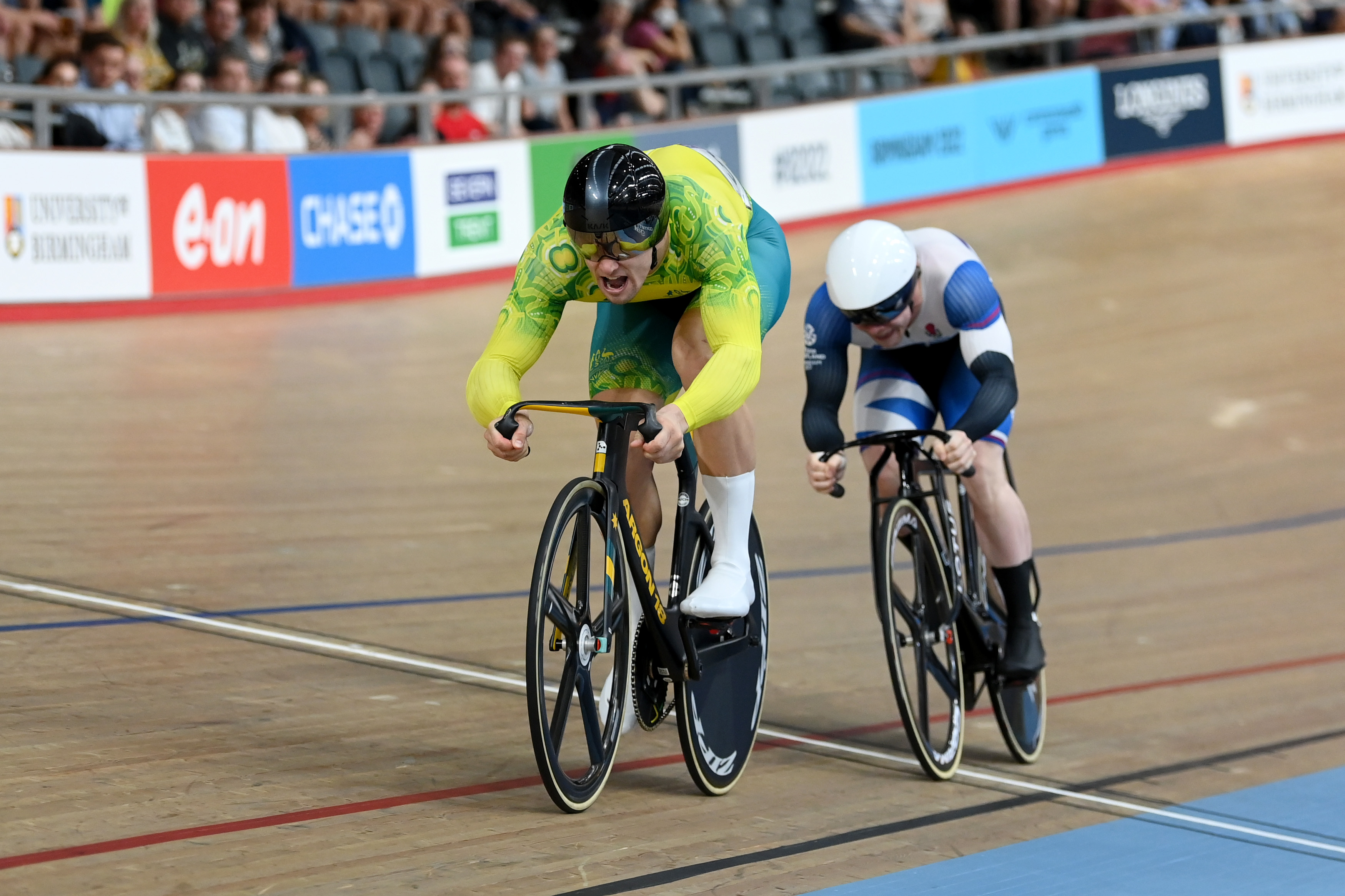 Matthew Glaetzer finishes ahead of Scotland's Jack Carlin in the third race of the men's sprint finals.