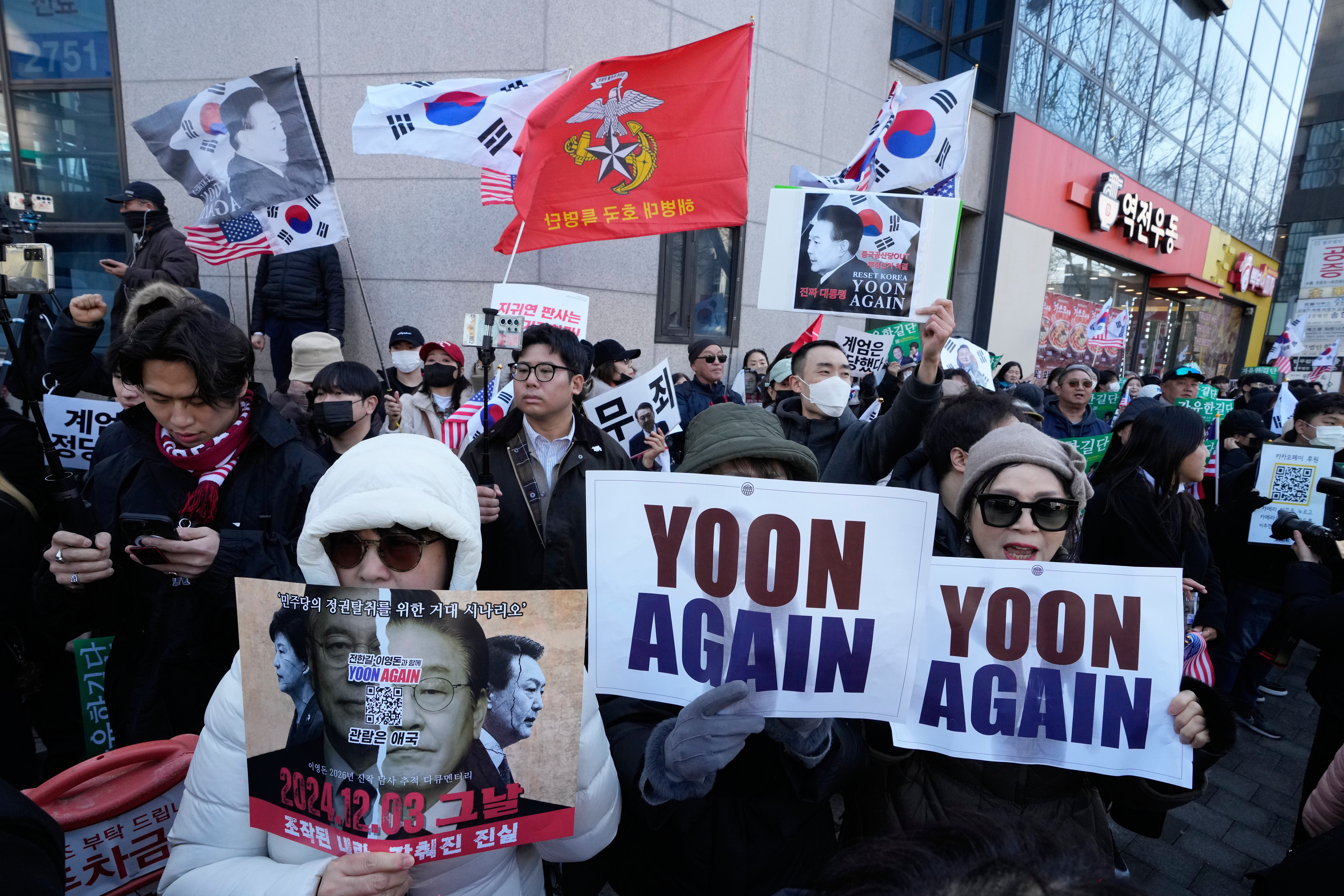 Supporters of former South Korean President Yoon Suk Yeol stage a rally outside of Seoul Central District Court in Seoul, South Korea