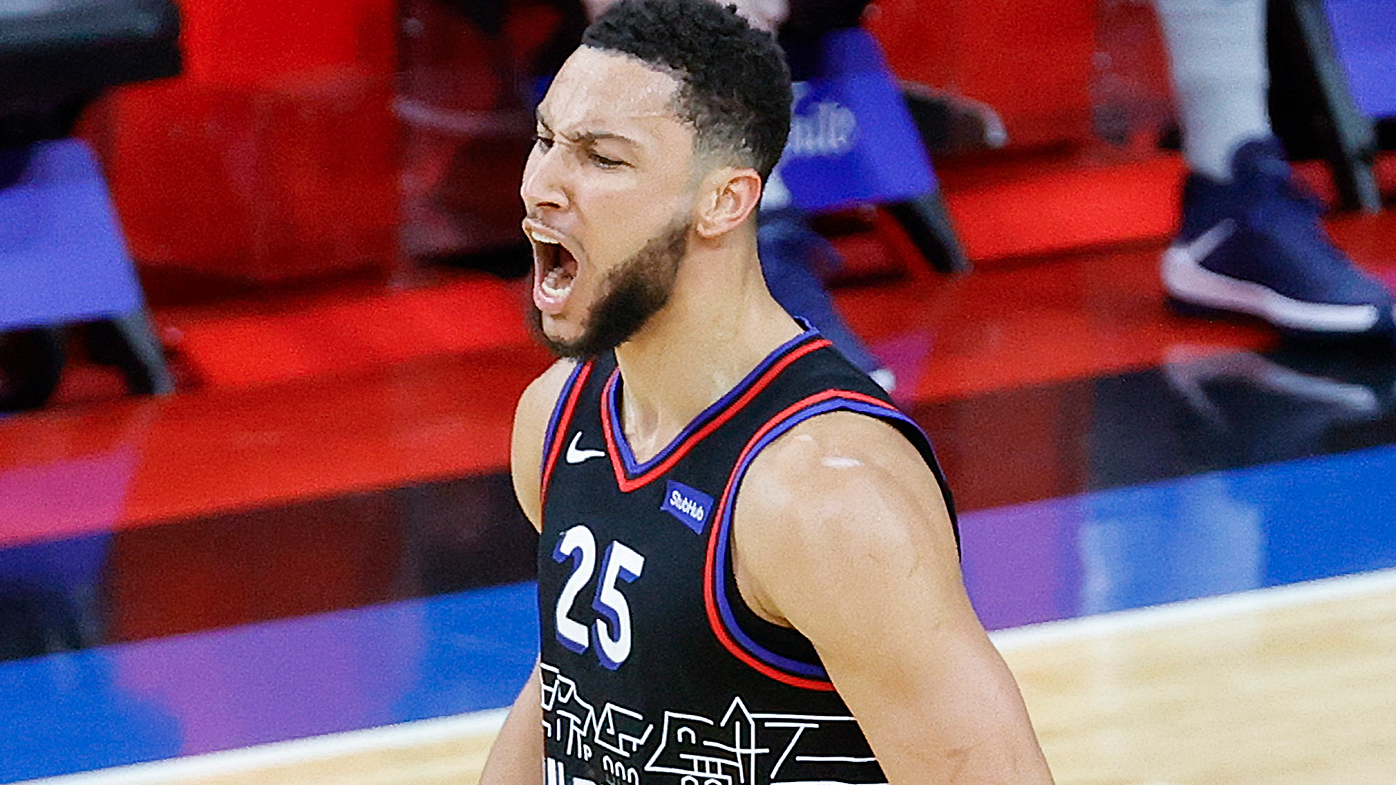 Ben Simmons #25 of the Philadelphia 76ers celebrates a dunk