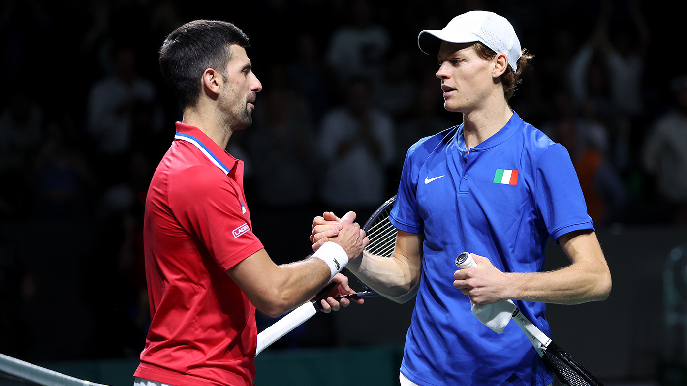 Jannik Sinner of Italy celebrates winning match point during the Semi-Final match against Novak Djokovic of Serbia in the Davis Cup Final at Palacio de Deportes Jose Maria Martin Carpena on November 25, 2023 in Malaga, Spain. (Photo by Clive Brunskill/Getty Images for ITF)