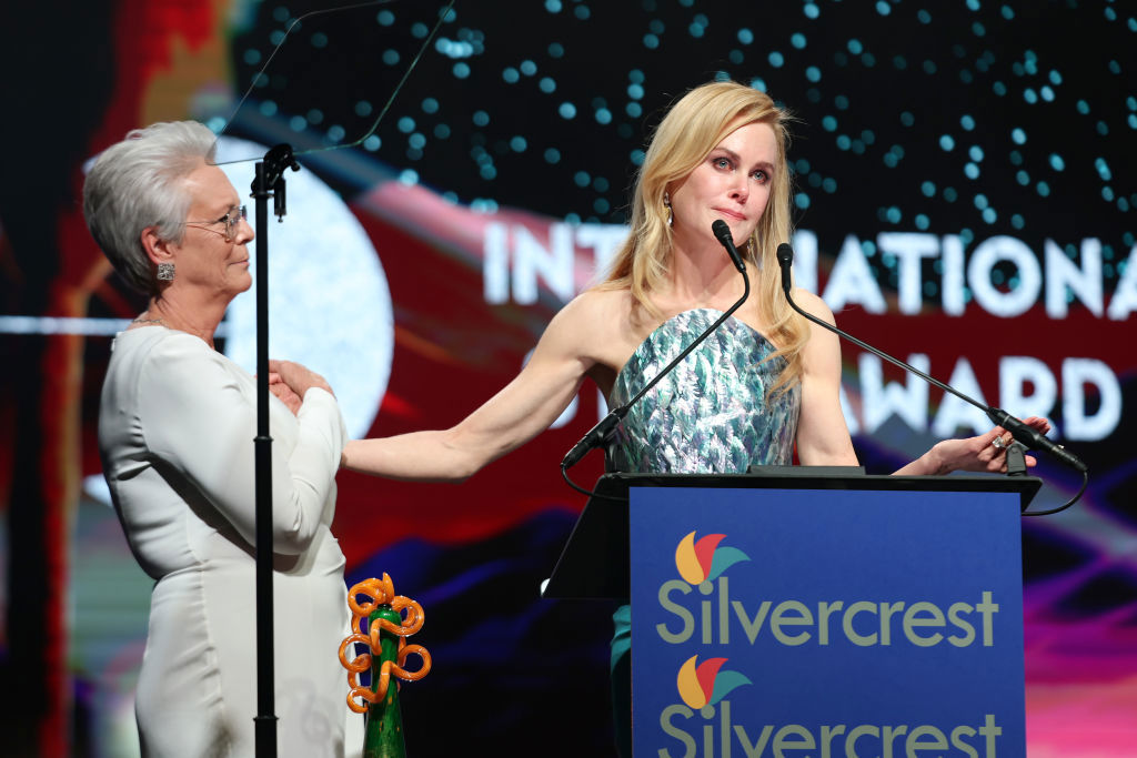 PALM SPRINGS, CALIFORNIA - JANUARY 03: Nicole Kidman (R) accepts the International Star Award from Jamie Lee Curtis (L) onstage during the 36th Annual Palm Springs International Film Awards at Palm Springs Convention Center on January 03, 2025 in Palm Springs, California. (Photo by Matt Winkelmeyer/Getty Images for Palm Springs International Film Society)