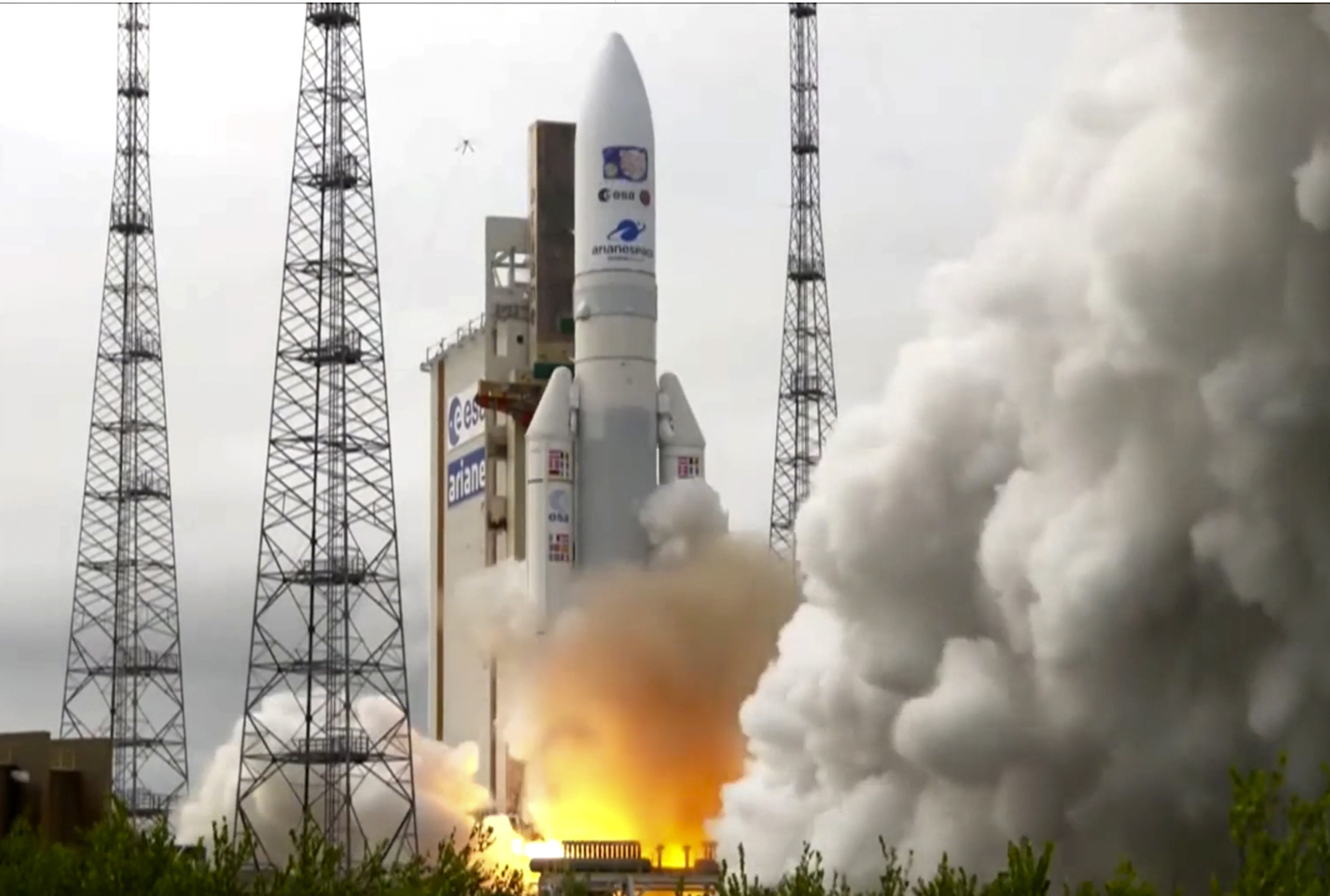 In this image provided by the European Space Agency, an Ariane rocket carrying the robotic explorer Juice takes off from Europe's Spaceport in French Guiana, Friday, April 14, 2023. 