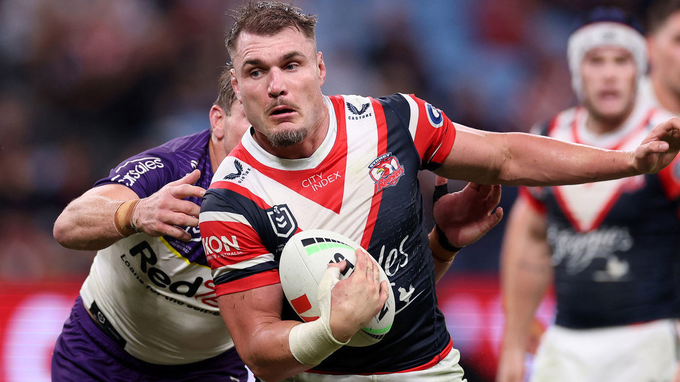 Angus Crichton runs the ball against the Storm.