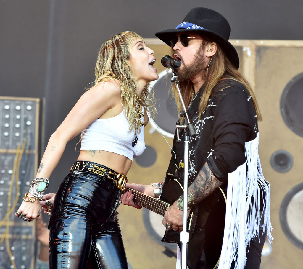 GLASTONBURY, ENGLAND - JUNE 30: Billy Ray Cyrus performs with Miley Cyrus on The Pyramid Stage during day five of Glastonbury Festival at Worthy Farm, Pilton on June 30, 2019 in Glastonbury, England. (Photo by Shirlaine Forrest/WireImage)