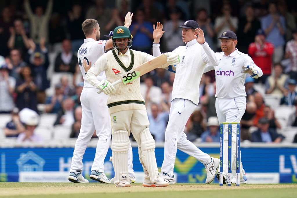 England's Chris Woakes (left) celebrates with team-mates the wicket of Australia's Usman Khawaja during day five of the fifth LV= Insurance Ashes Series test match at The Kia Oval, London. Picture date: Monday July 31, 2023. (Photo by John Walton/PA Images via Getty Images)