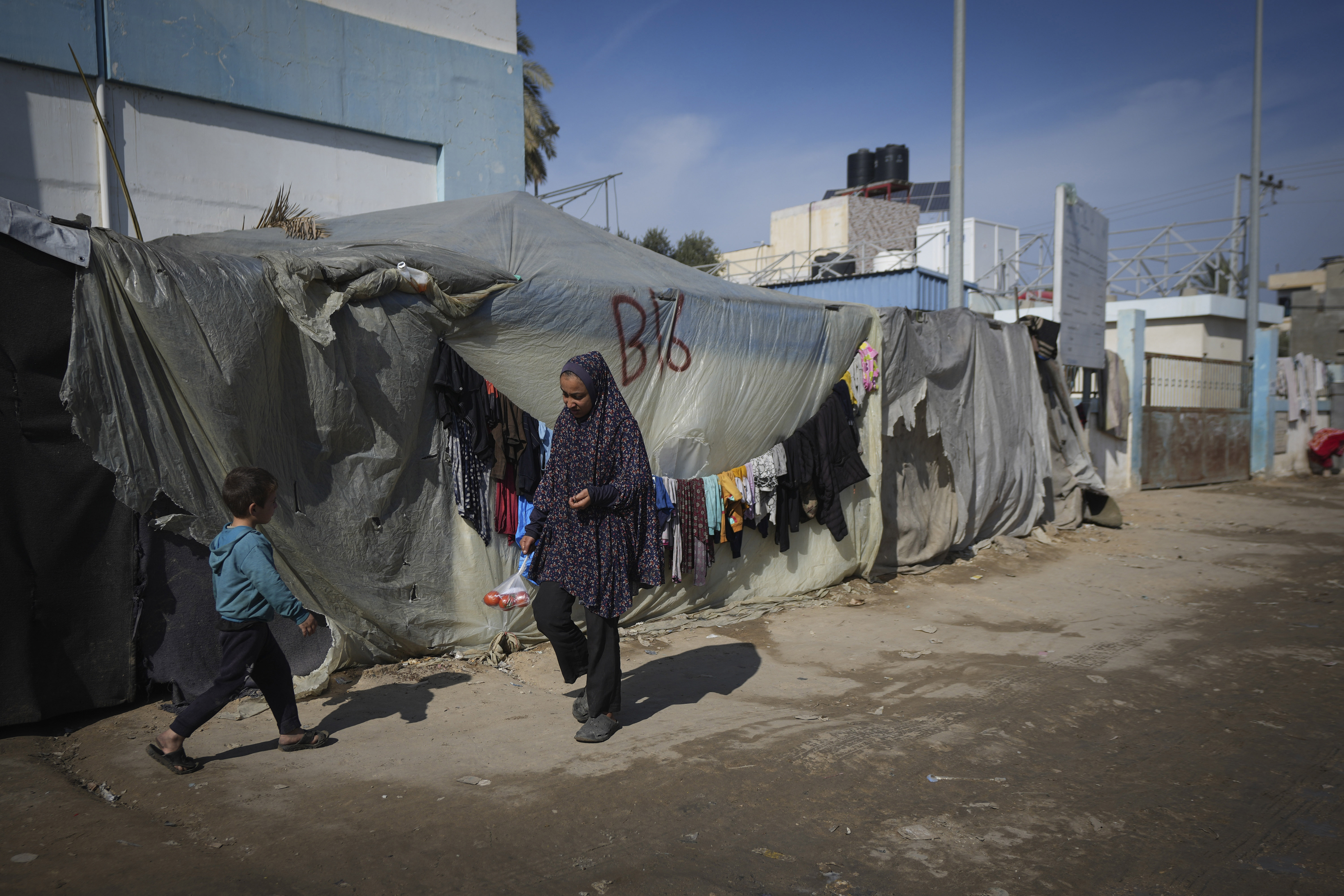 Israeli military says it ‘continues to attack’ in Gaza as dispute delays ceasefire