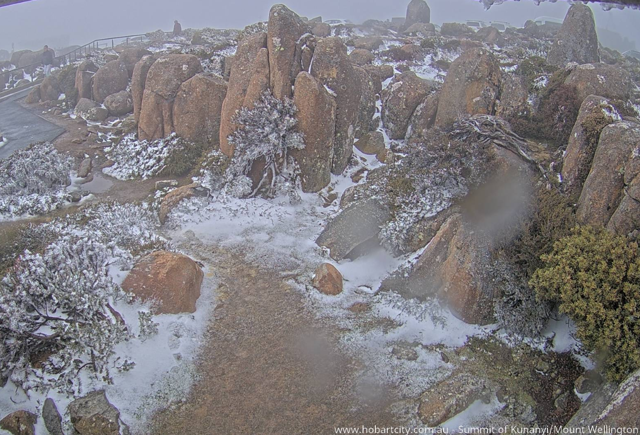 Showers and cold weather has seen some snowfall about the peaks in Tasmania.