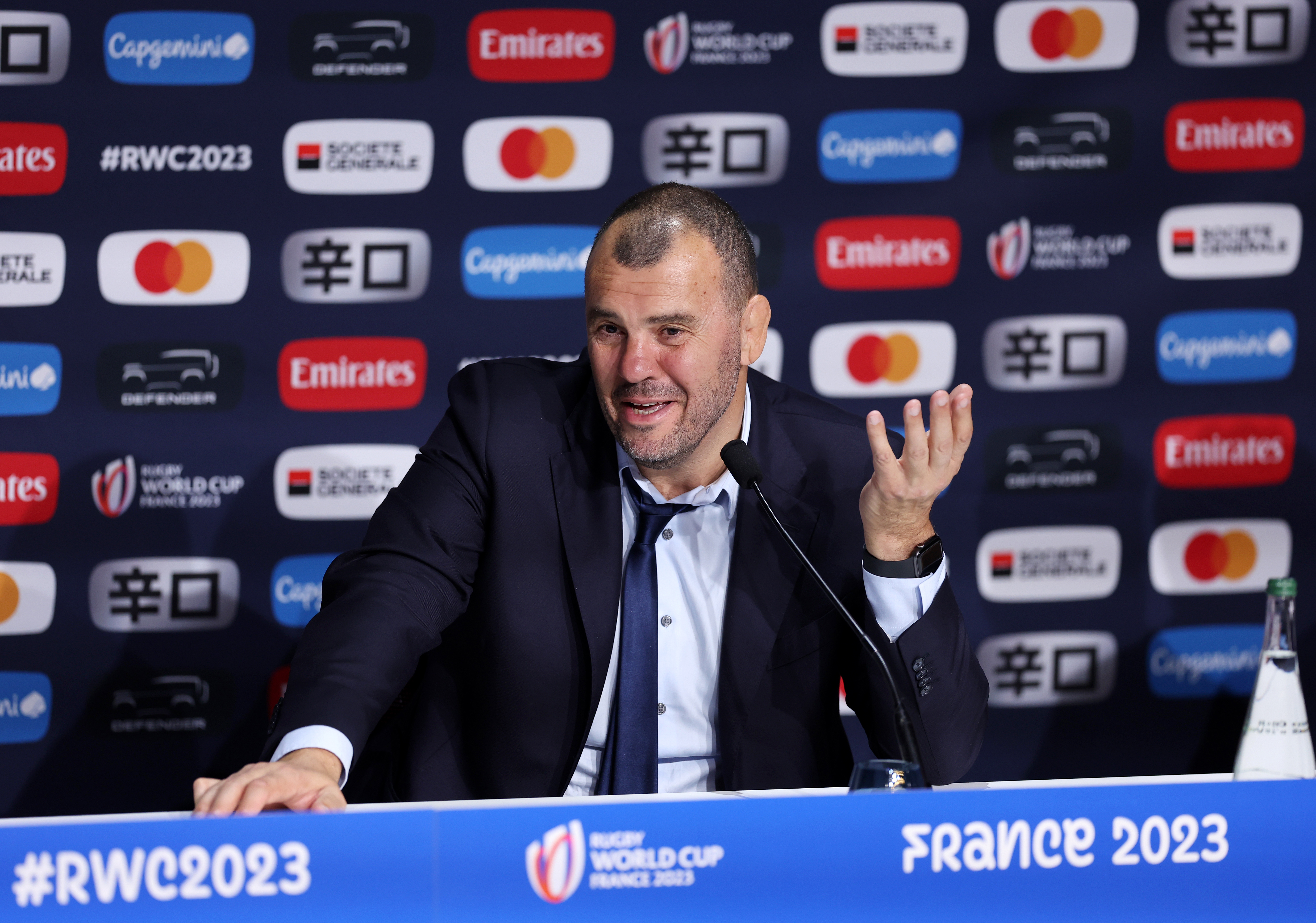 Michael Cheika speaks to the media at Stade de France.
