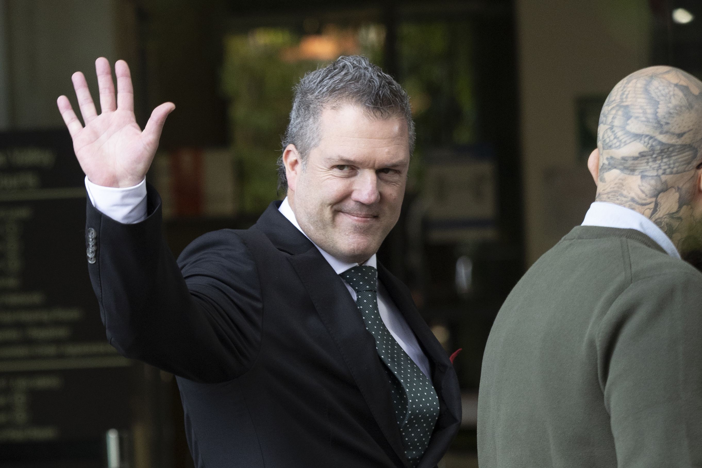 Dr Chris Webster outside court during Erin Patterson's murder case.