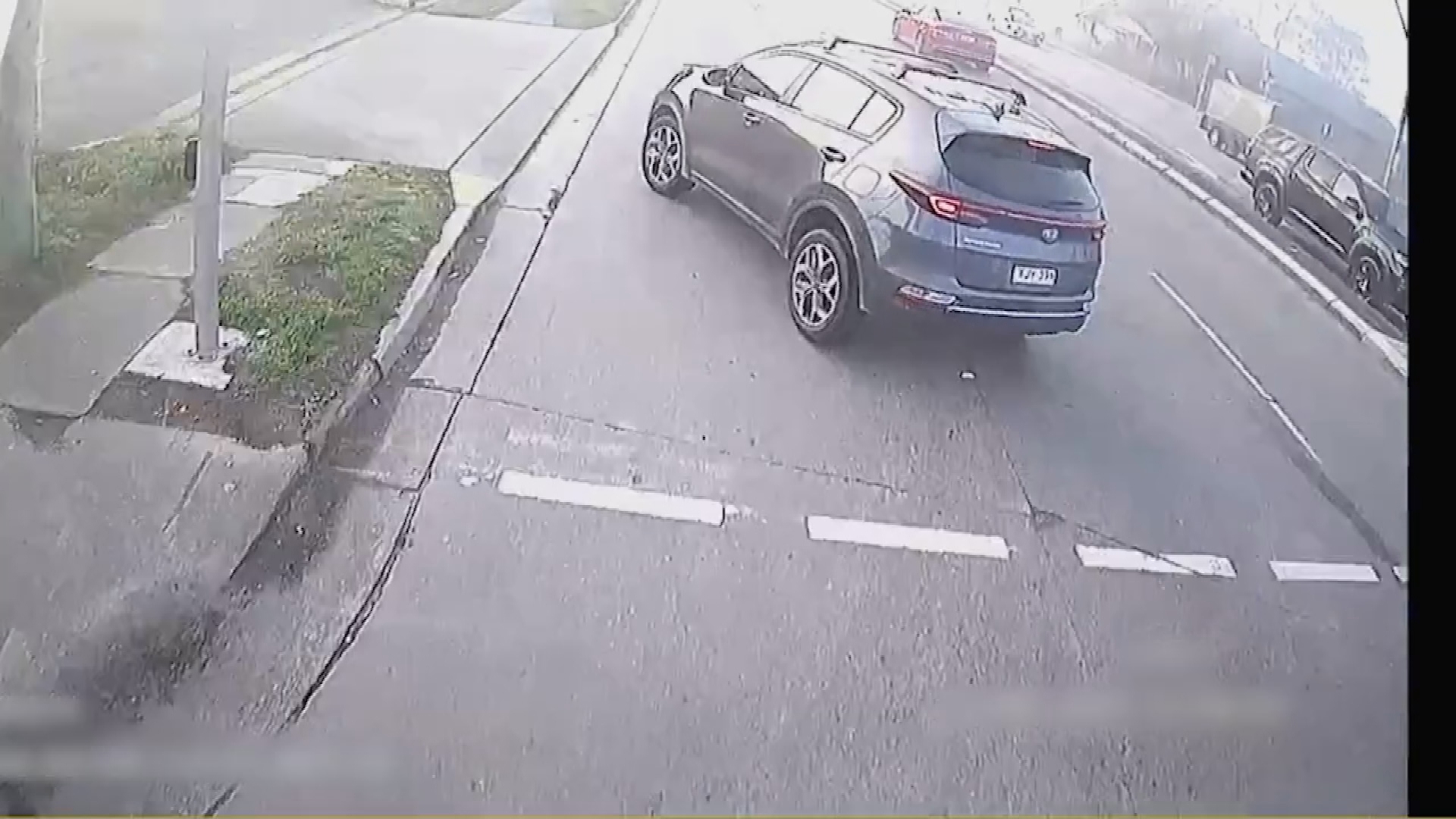 A car pulling out in front of an oncoming vehicle captured on a dashcam. 