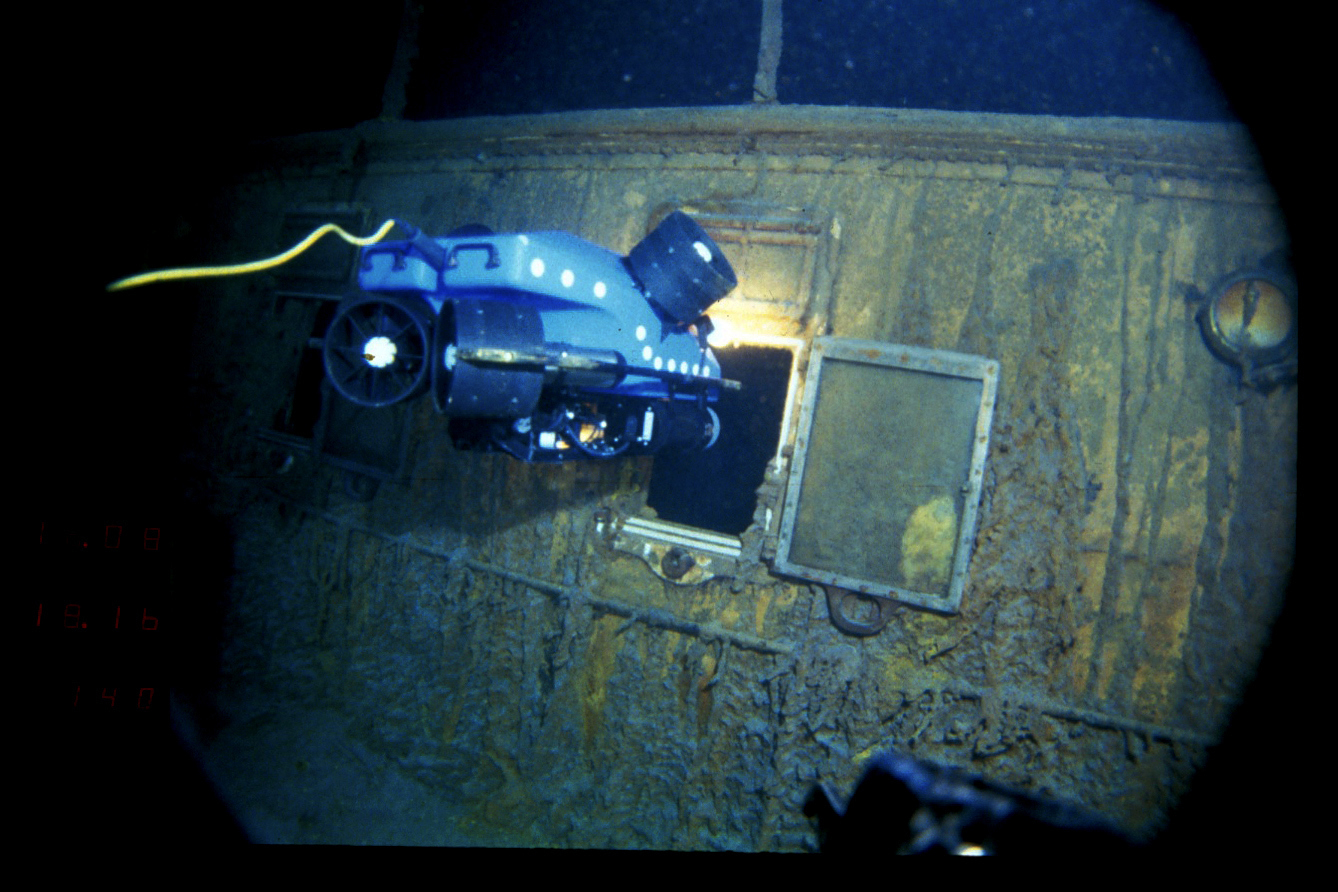 An underwater remote vehicle examines an open window of the Titanic 3.8 kilometres below the surface of the ocean, 640 kilometres off the coast of Newfoundland, Canada in 1986.