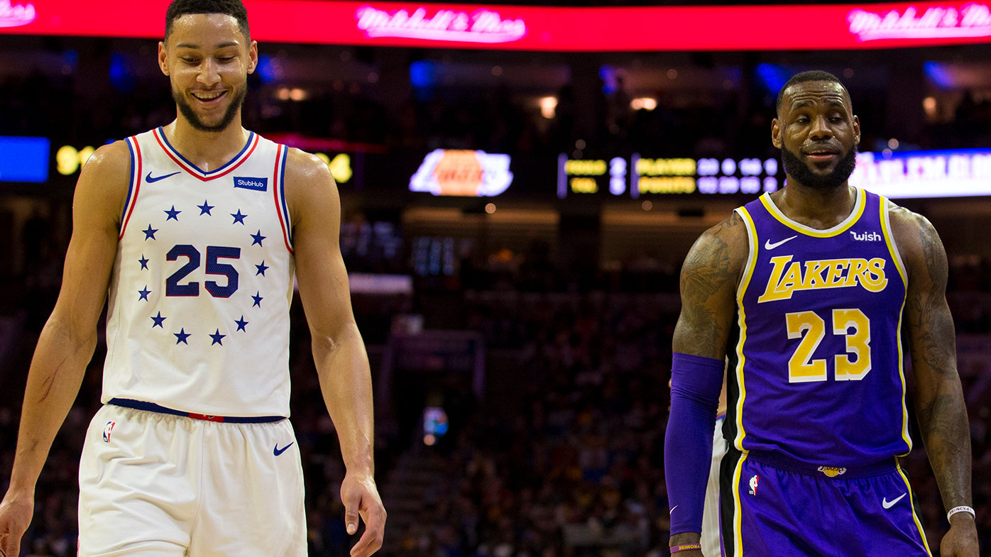 Ben Simmons #25 of the Philadelphia 76ers talks to LeBron James #23 of the Los Angeles Lakers 