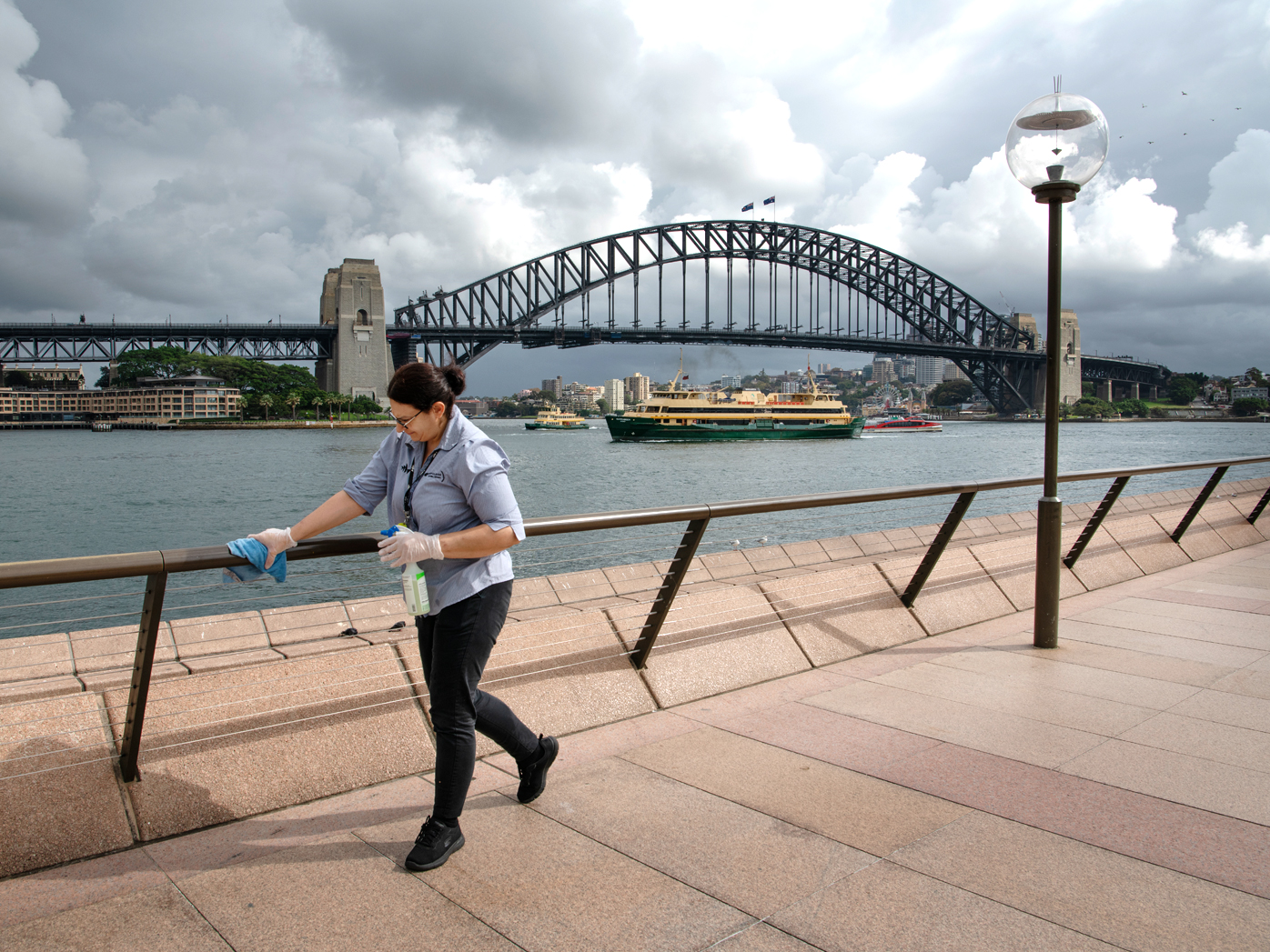 Railings being cleaned at the Sydney Opera House forecourt during the coronavirus crisis.