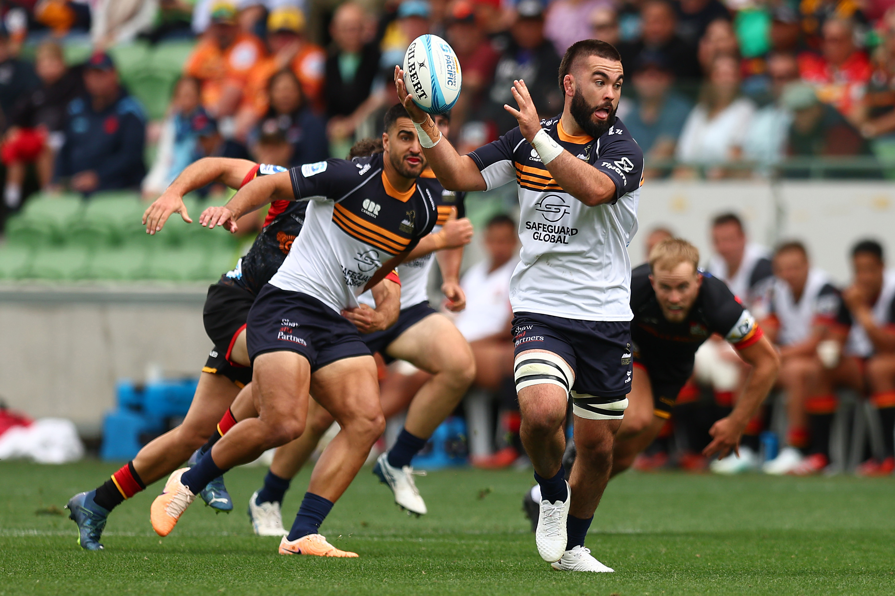 Luke Reimer of the Brumbies runs with the ball during the round two Super Rugby Pacific match.