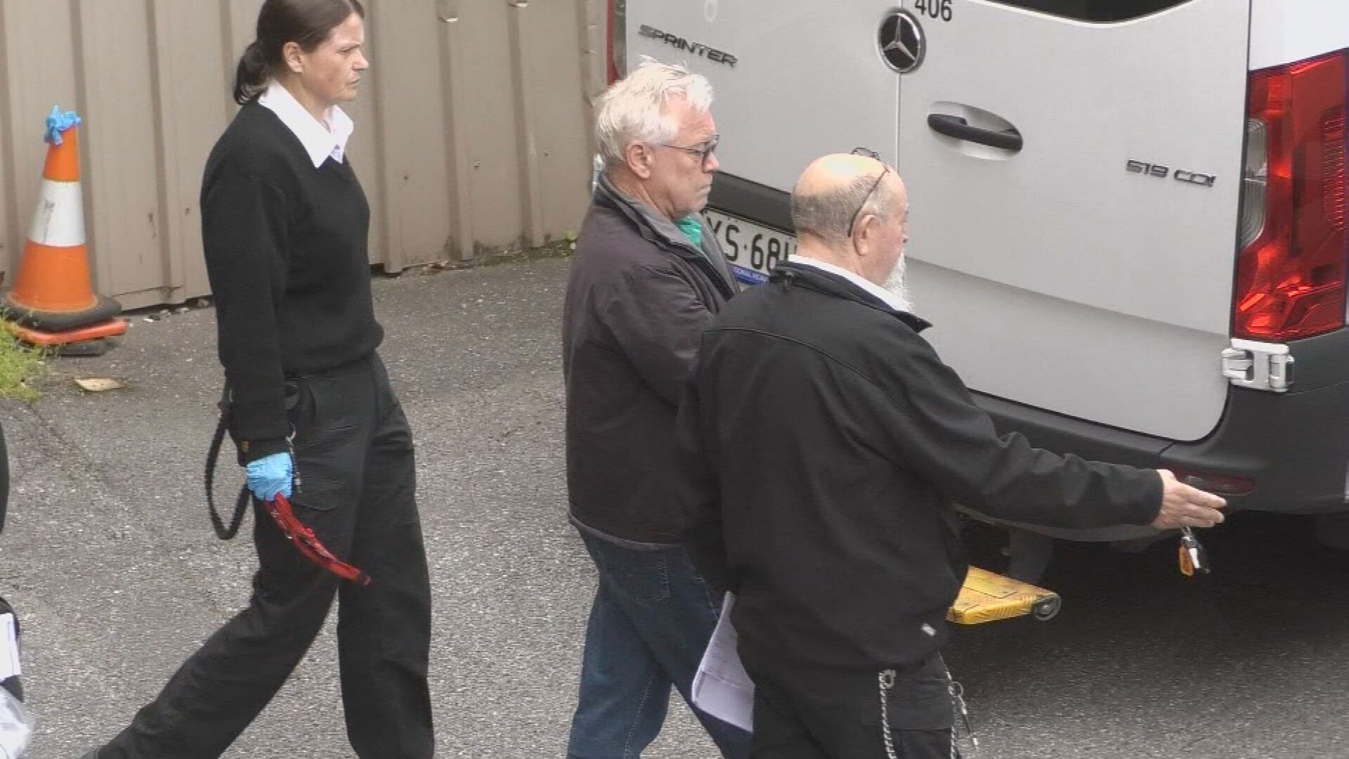 Poole (centre) did not apply for bail in Adelaide Magistrates Court today.