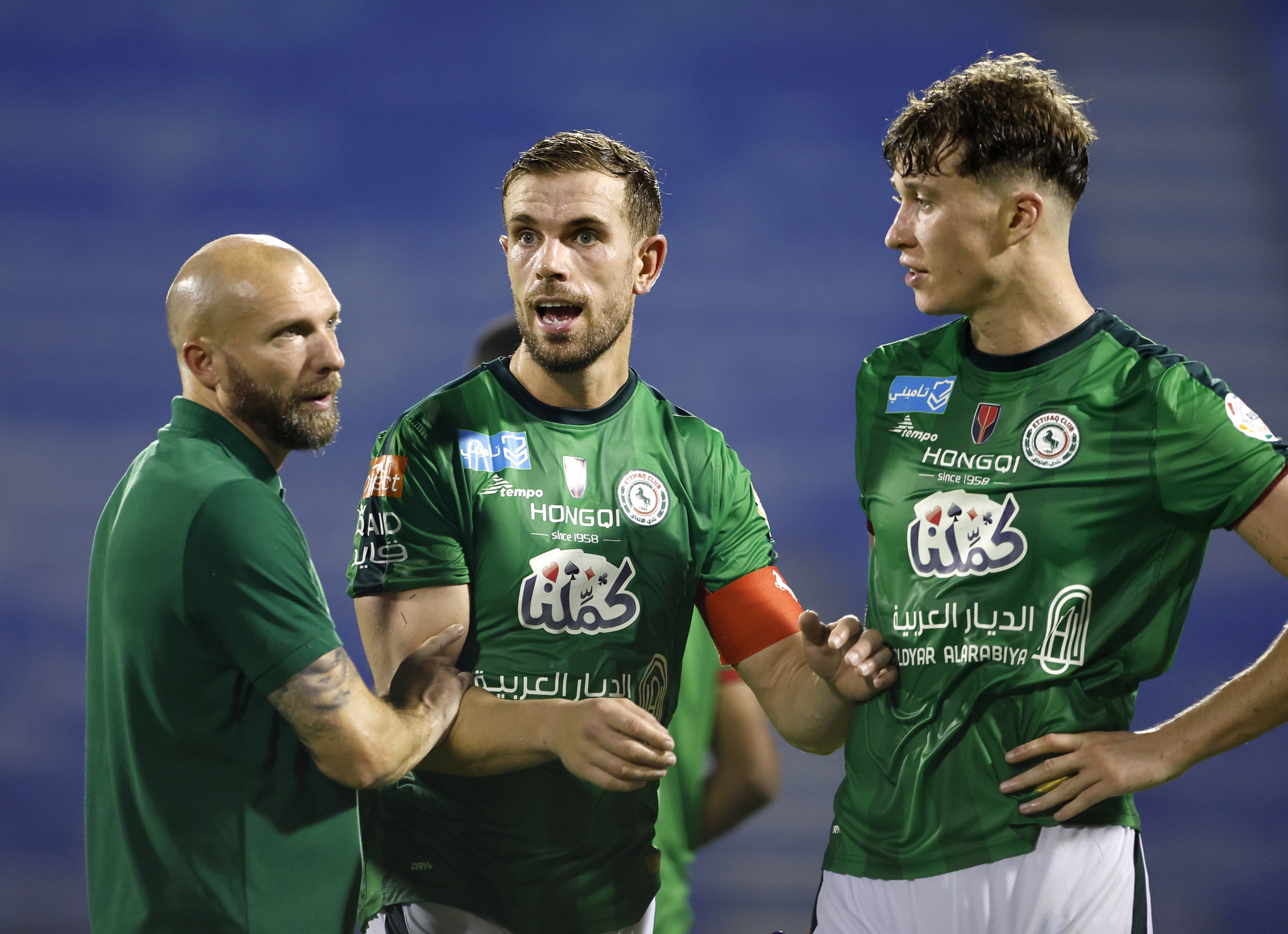 Jordan Henderson of Al-Ettifaq speaks to Jack William Hendry after the Saudi Pro League match.