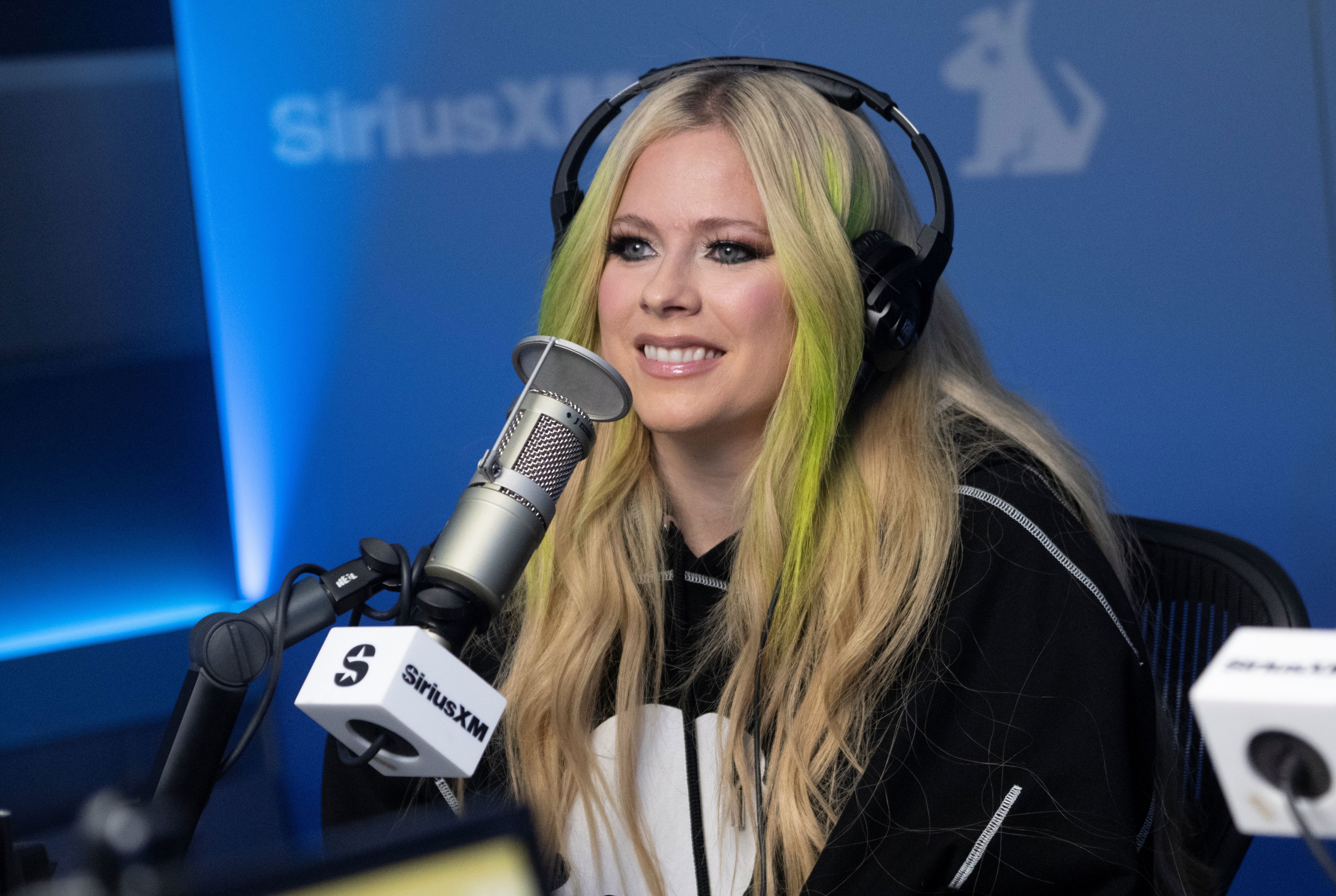 Avril Lavigne visits 'Hits 1' at the SiriusXM Studios on May 29, 2025 in New York City.