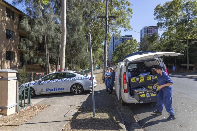 Police attend a block of units at 42-44 Newman Street, Merrylands, where a 44-year-old man died from a gunshot wound early Saturday morning.