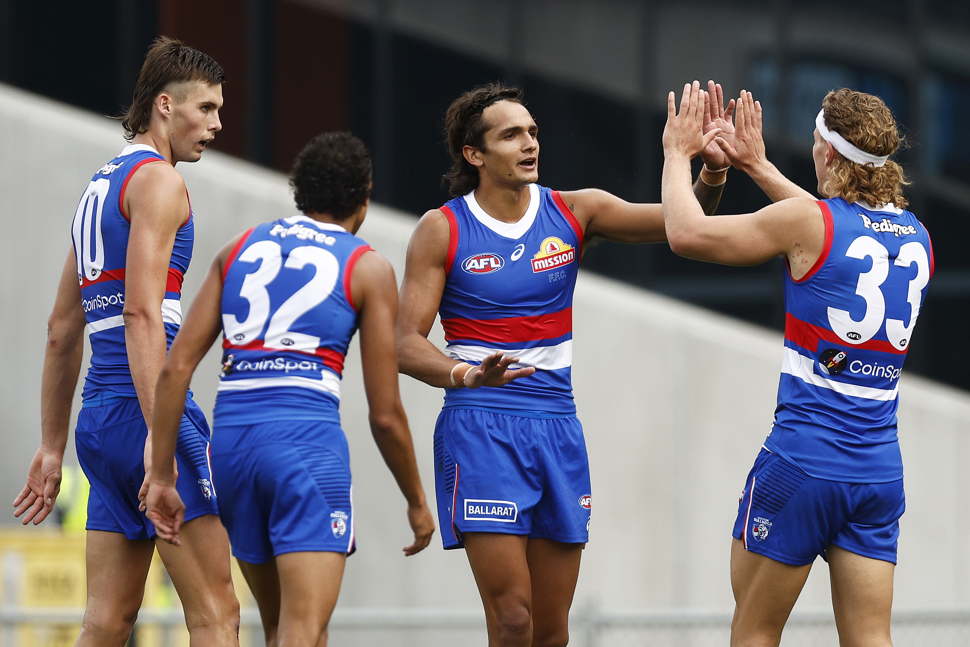 Jamarra Ugle-Hagan of the Bulldogs (C) celebrates kicking a goal during the AFL Practice Match between the Western Bulldogs and the North Melbourne Kangaroos at Ikon Park on March 04, 2023 in Melbourne, Australia. (Photo by Daniel Pockett/AFL Photos/via Getty Images )