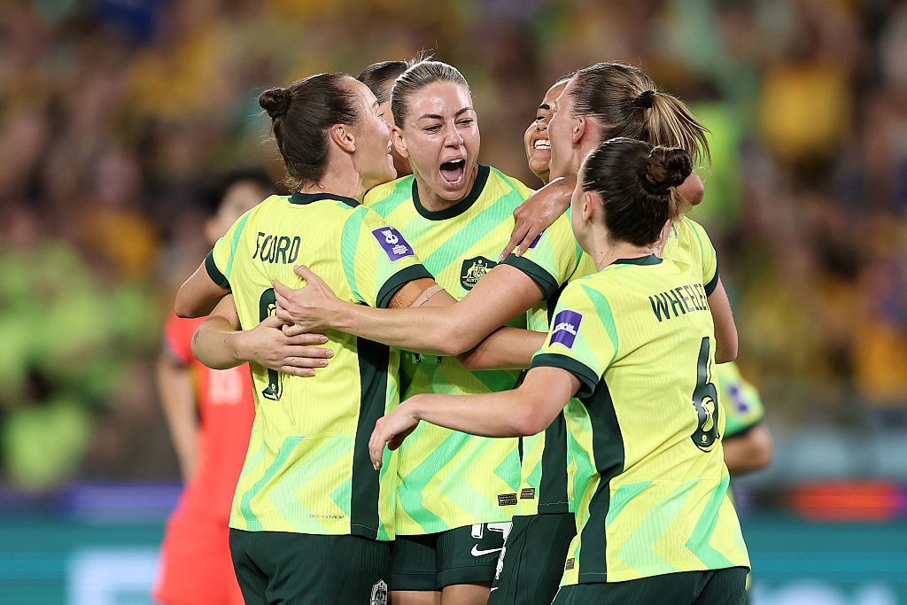 Alanna Kennedy of Australia celebrates with teammates.