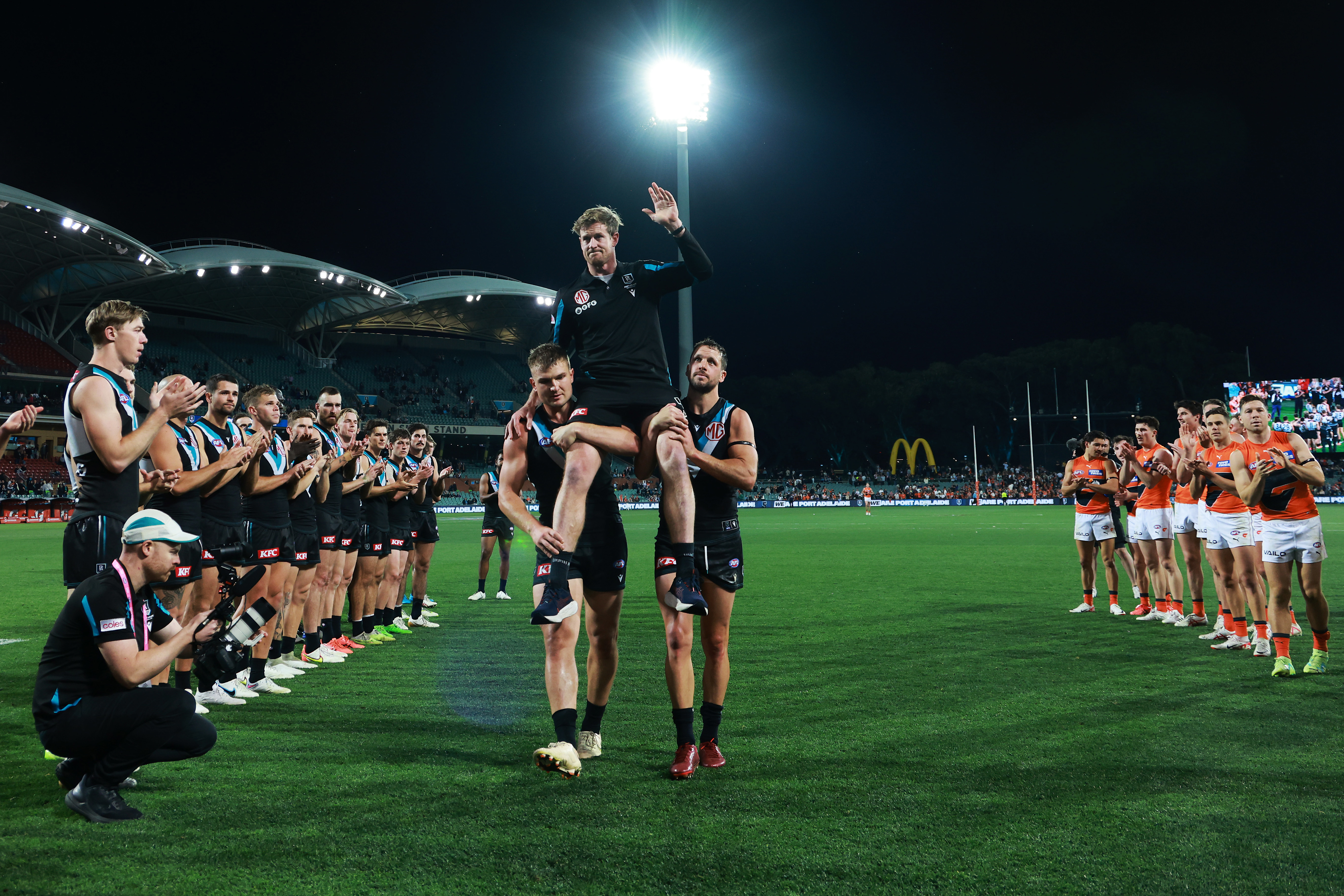 Tom Jonas was chaired off by Ollie Wines and Travis Boak after Port Adelaide was knocked out of the premiership race.