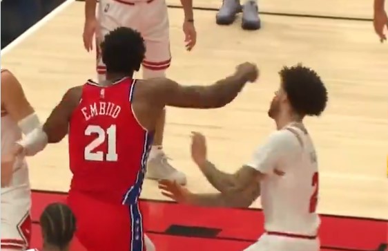 Joel Embiid almost accidentally punches Lonzo Ball.