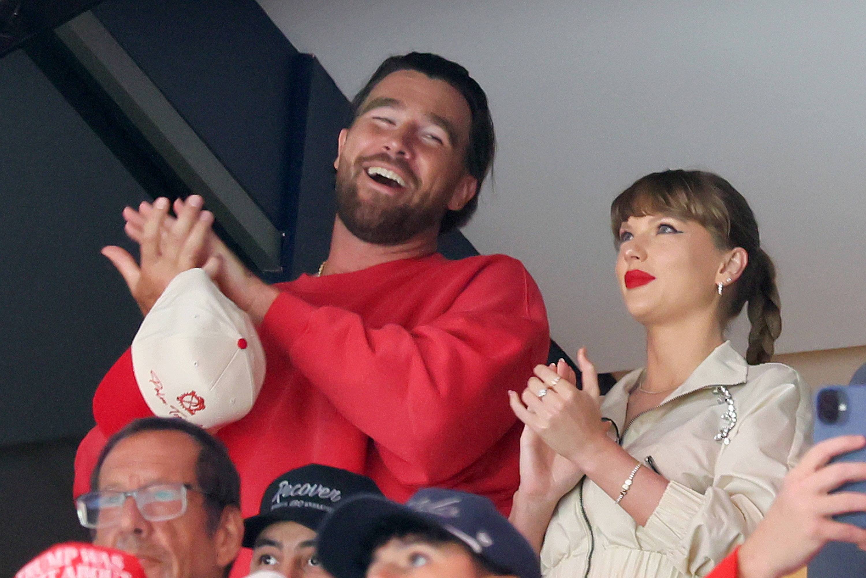 SUNRISE, FLORIDA - JUNE 12: Travis Kelce, left, and Taylor Swift react as the Edmonton Oilers and the Florida Panthers play during the first period in Game Four of the 2025 Stanley Cup Final at Amerant Bank Arena on June 12, 2025 in Sunrise, Florida. (Photo by Bruce Bennett/Getty Images)