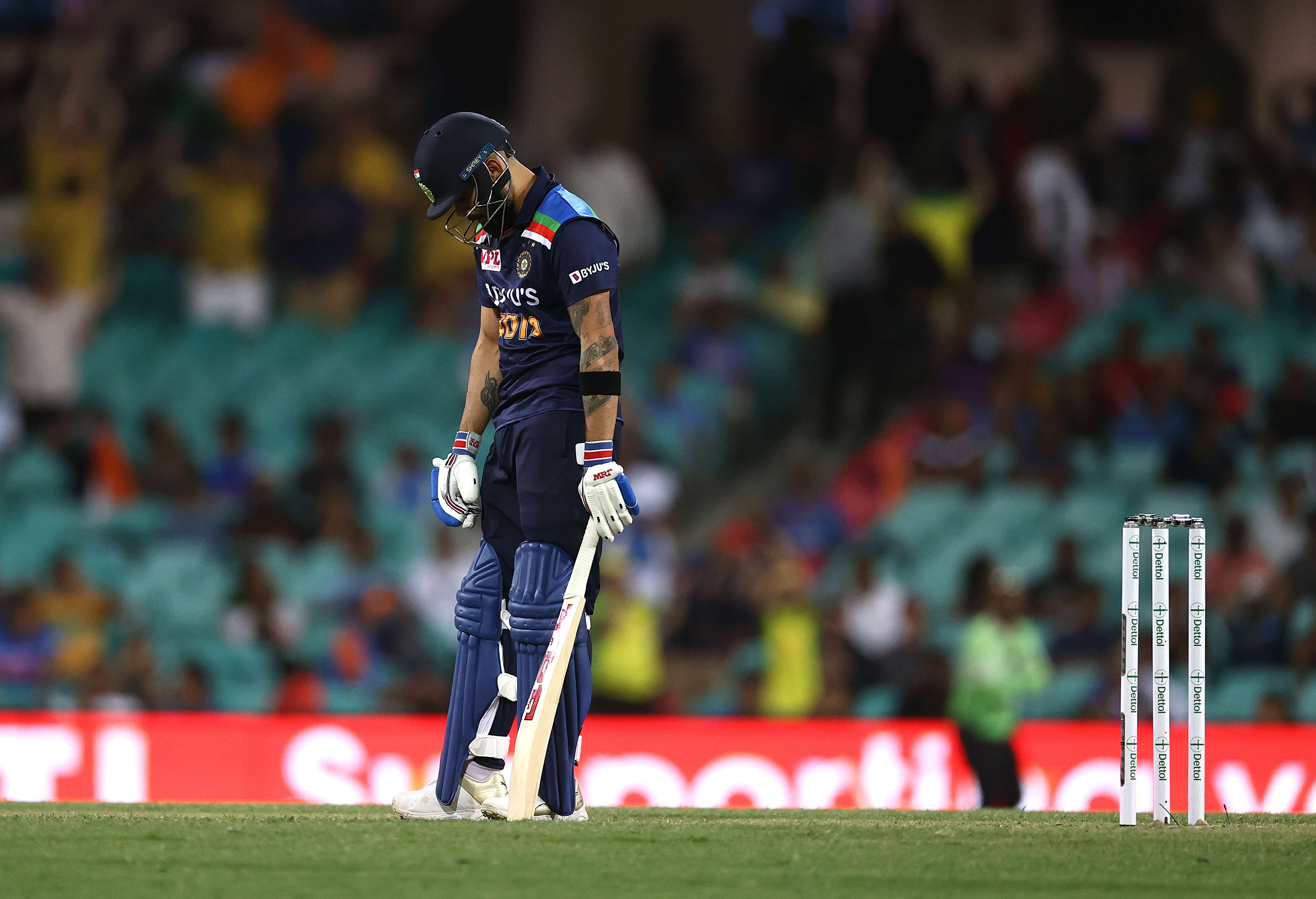 Virat Kohli of India looks dejected after being dismissed by Josh Hazlewood of Australia.