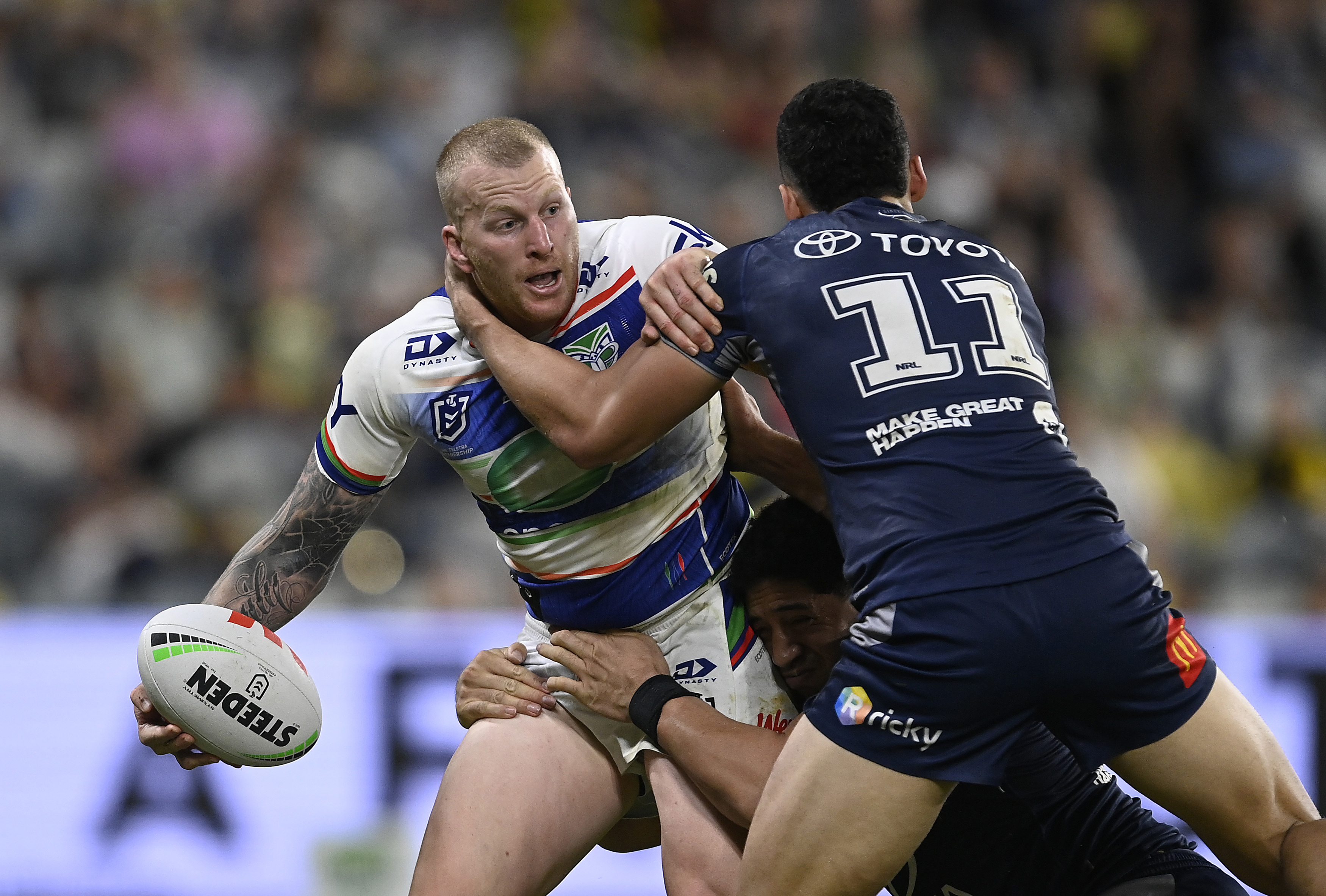 TOWNSVILLE, AUSTRALIA - JUNE 08: Mitch Barnett of the Warriors looks to pass the ball during the round 14 NRL match between North Queensland Cowboys and New Zealand Warriors at Qld Country Bank Stadium, on June 08, 2024, in Townsville, Australia. (Photo by Ian Hitchcock/Getty Images)