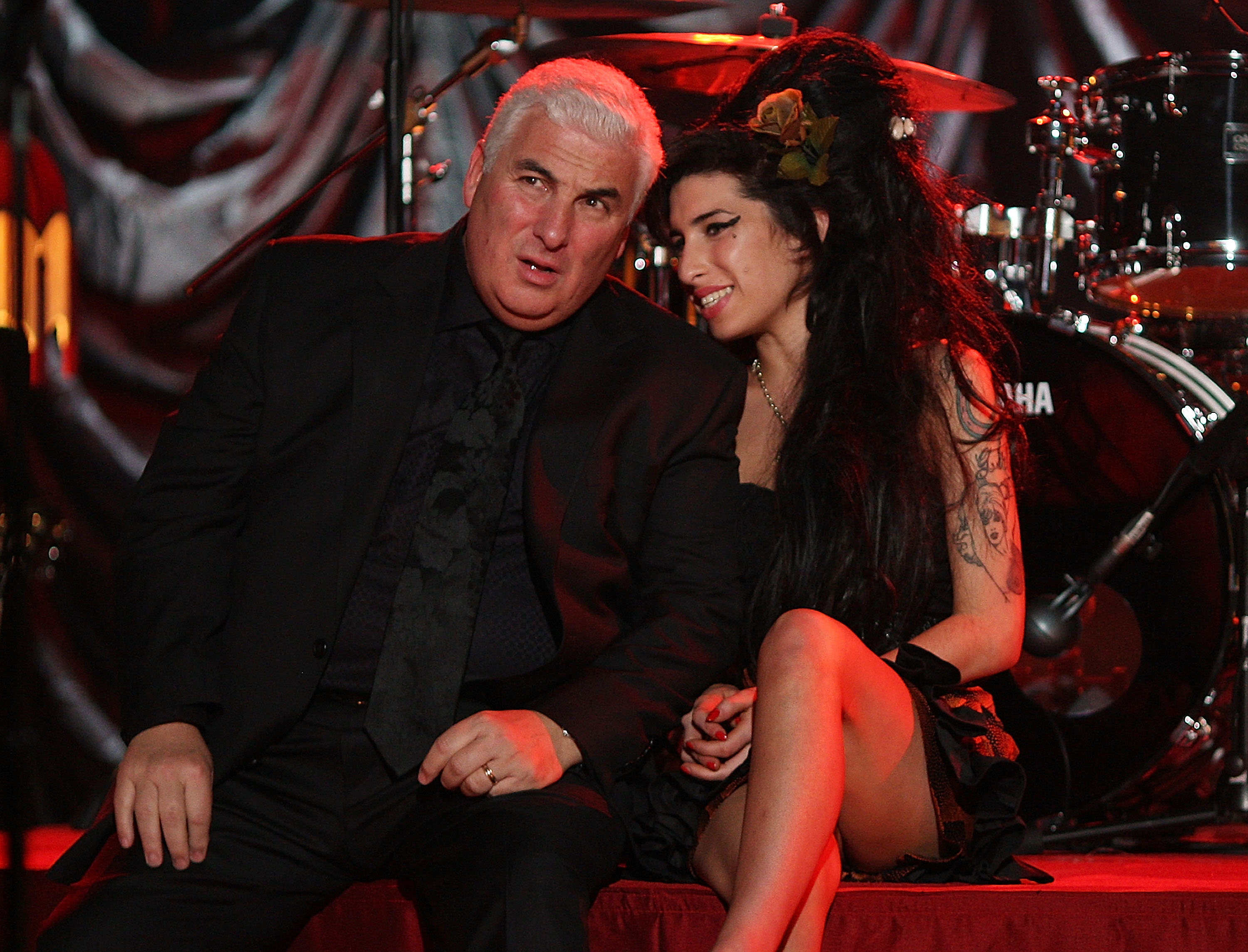 British singer Amy Winehouse with her dad Mitch Winehouse at The Riverside Studios for the 50th Grammy Awards ceremony via video link on February 10, 2008 in London, England.