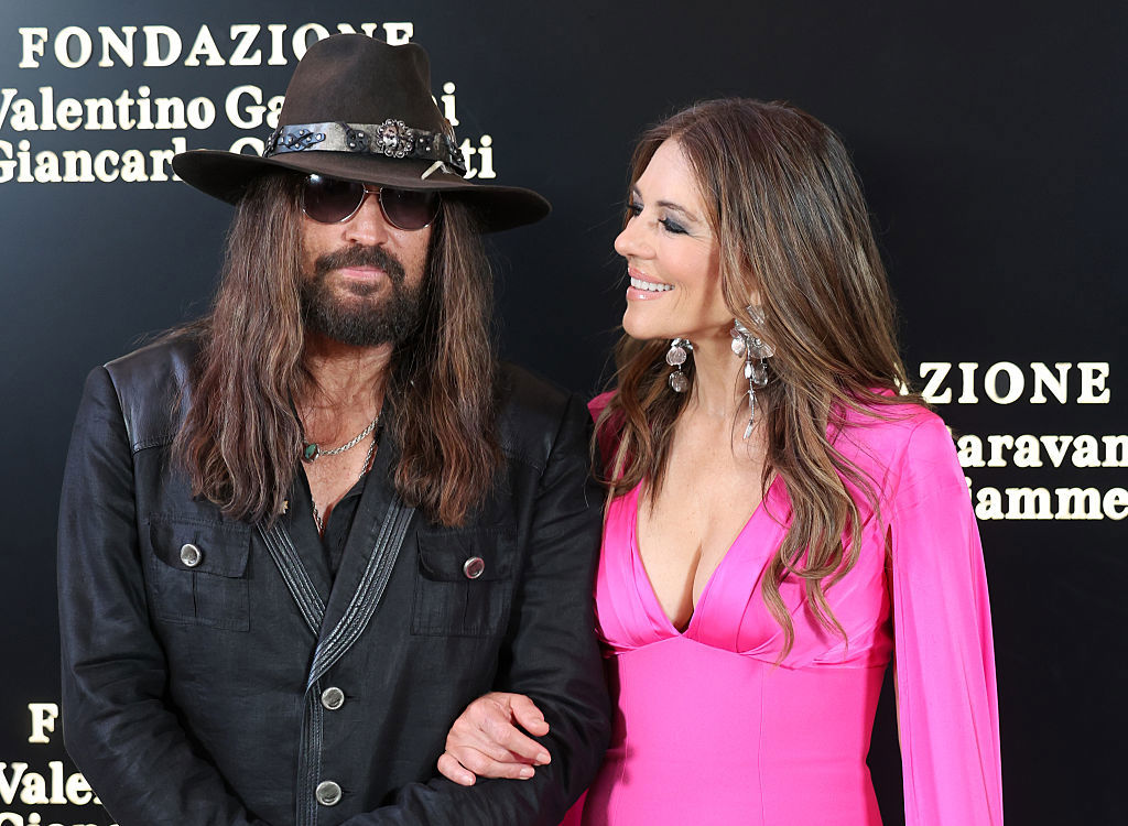 ROME, ITALY - MAY 24: Billy Ray Cyrus and Elizabeth Hurley attend the "Orizzonti | Rosso" Exhibition Opening Dinner at Palazzo Barberini on May 24, 2025 in Rome, Italy. (Photo by Elisabetta A. Villa/Getty Images)