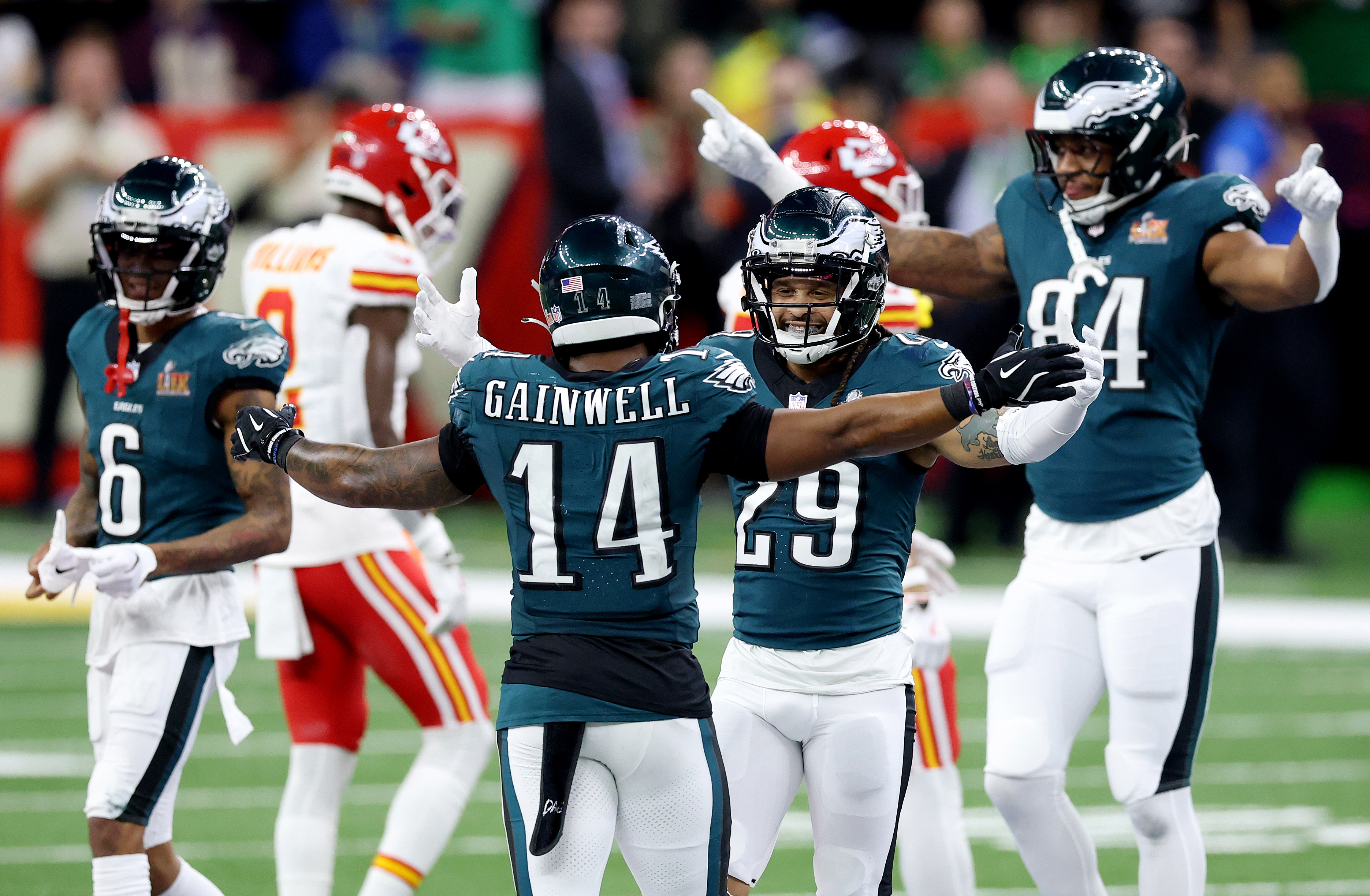 NEW ORLEANS, LOUISIANA - FEBRUARY 09: Kenneth Gainwell #14 and Avonte Maddox #29 of the Philadelphia Eagles celebrate after beating the Kansas City Chiefs 40-22 to win Super Bowl LIX at Caesars Superdome on February 09, 2025 in New Orleans, Louisiana. (Photo by Emilee Chinn/Getty Images)