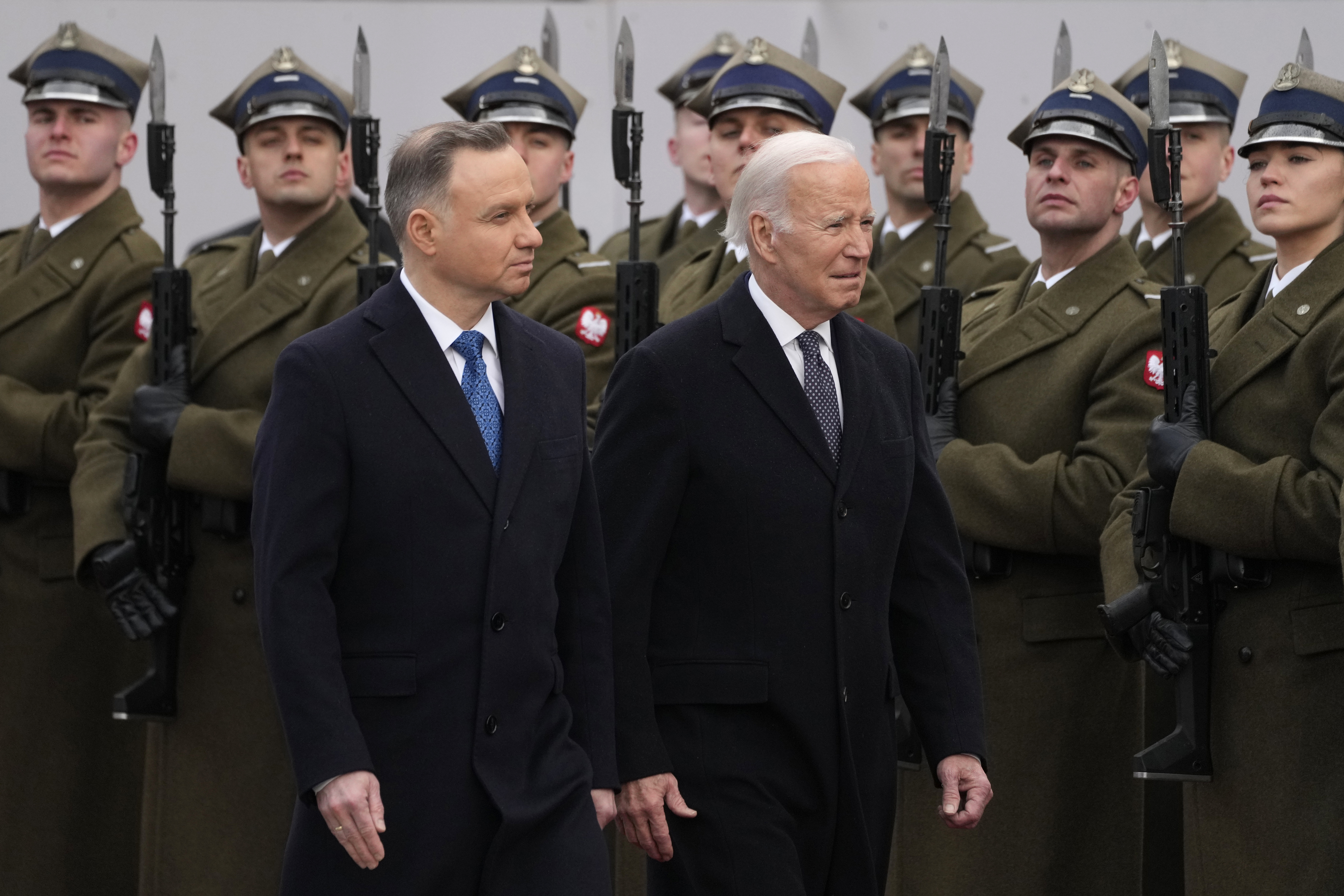 Polish President Andrzej Duda, left, welcomes President Joe Biden at the Presidential Palace in Warsaw, Ukraine, Tuesday, Feb. 21, 2023. 