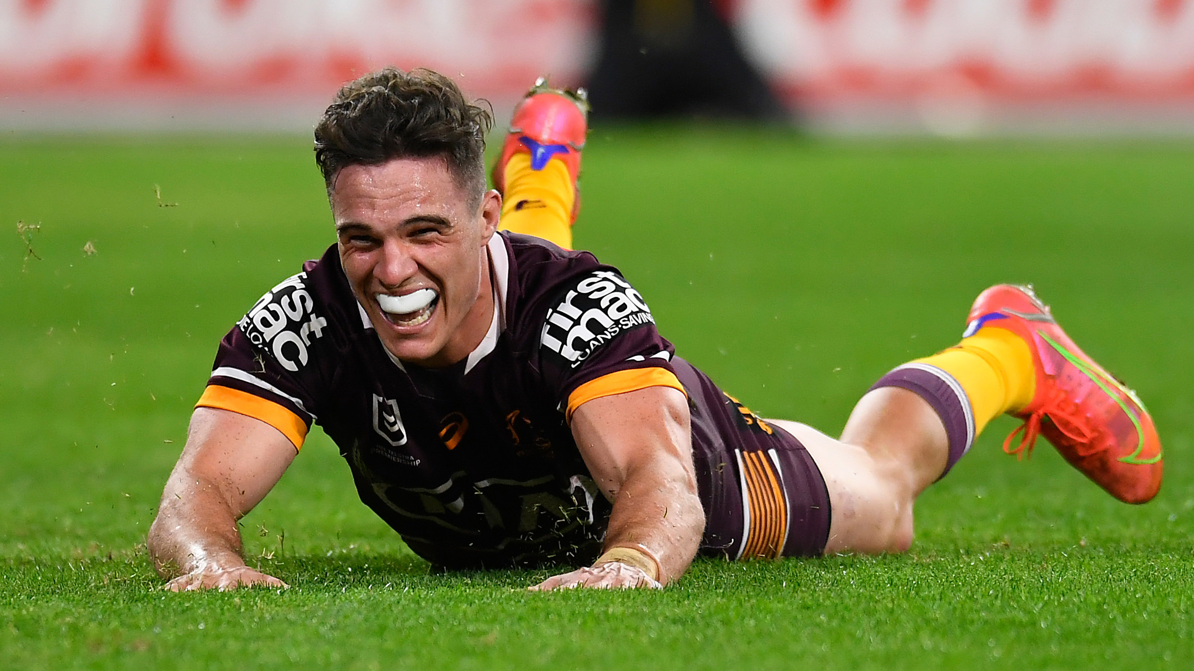 Brodie Croft of the Broncos scores a try during the round 20 NRL match between the Brisbane Broncos and the North Queensland Cowboys at Suncorp Stadium, on July 30, 2021, in Brisbane, Australia. (Photo by Albert Perez/Getty Images)
