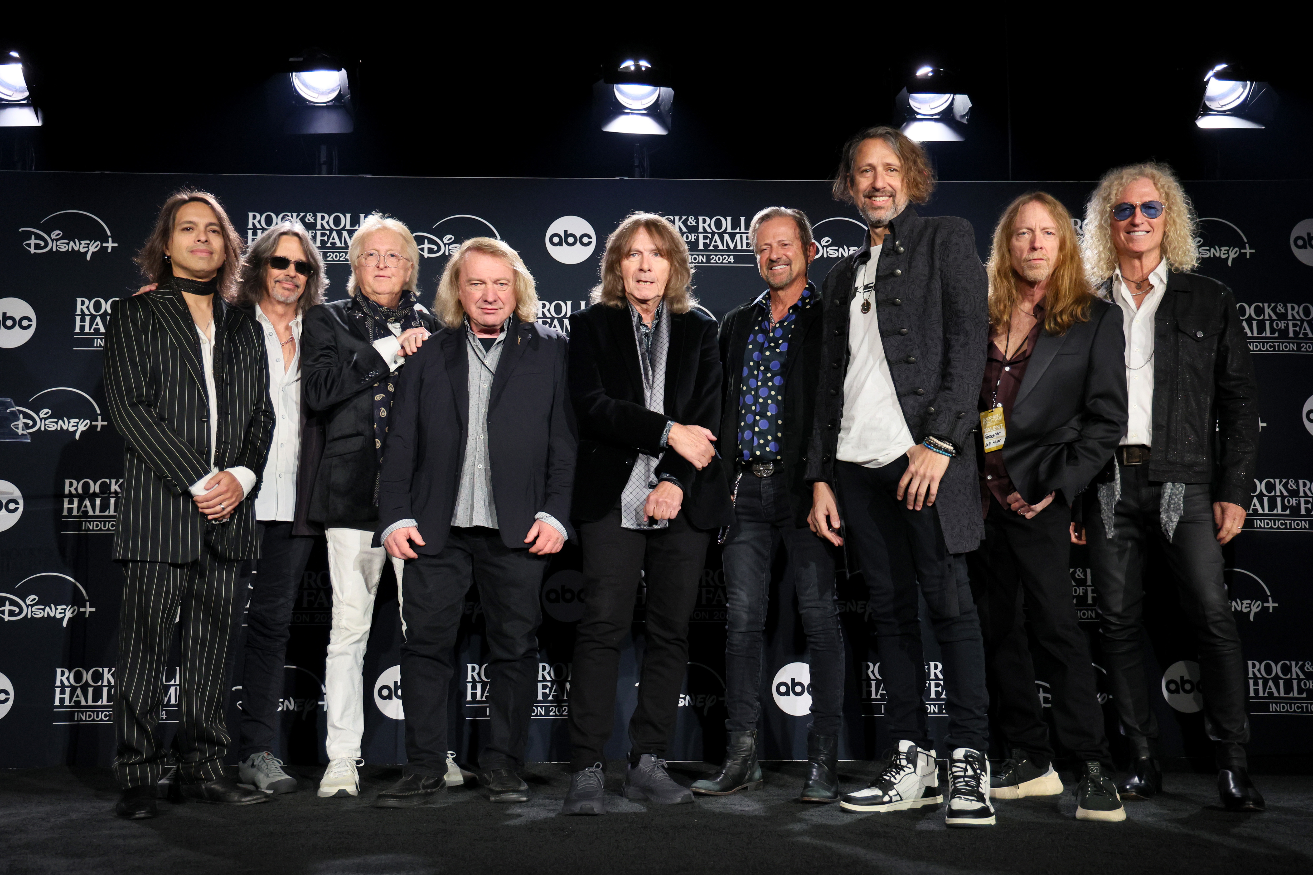 CLEVELAND, OHIO - OCTOBER 19: (L-R) Luis Maldonado, Kelly Hansen, Rick Wills, Lou Gramm, Al Greenwood, Chris Frazier, Michael Bluestein, Jeff Pilson and Bruce Watson of Foreigner pose in the press room during the 2024 Rock & Roll Hall Of Fame Induction Ceremony streaming on Disney+ at Rocket Mortgage Fieldhouse on October 19, 2024 in Cleveland, Ohio. (Photo by Dia Dipasupil/2024 Getty Images)