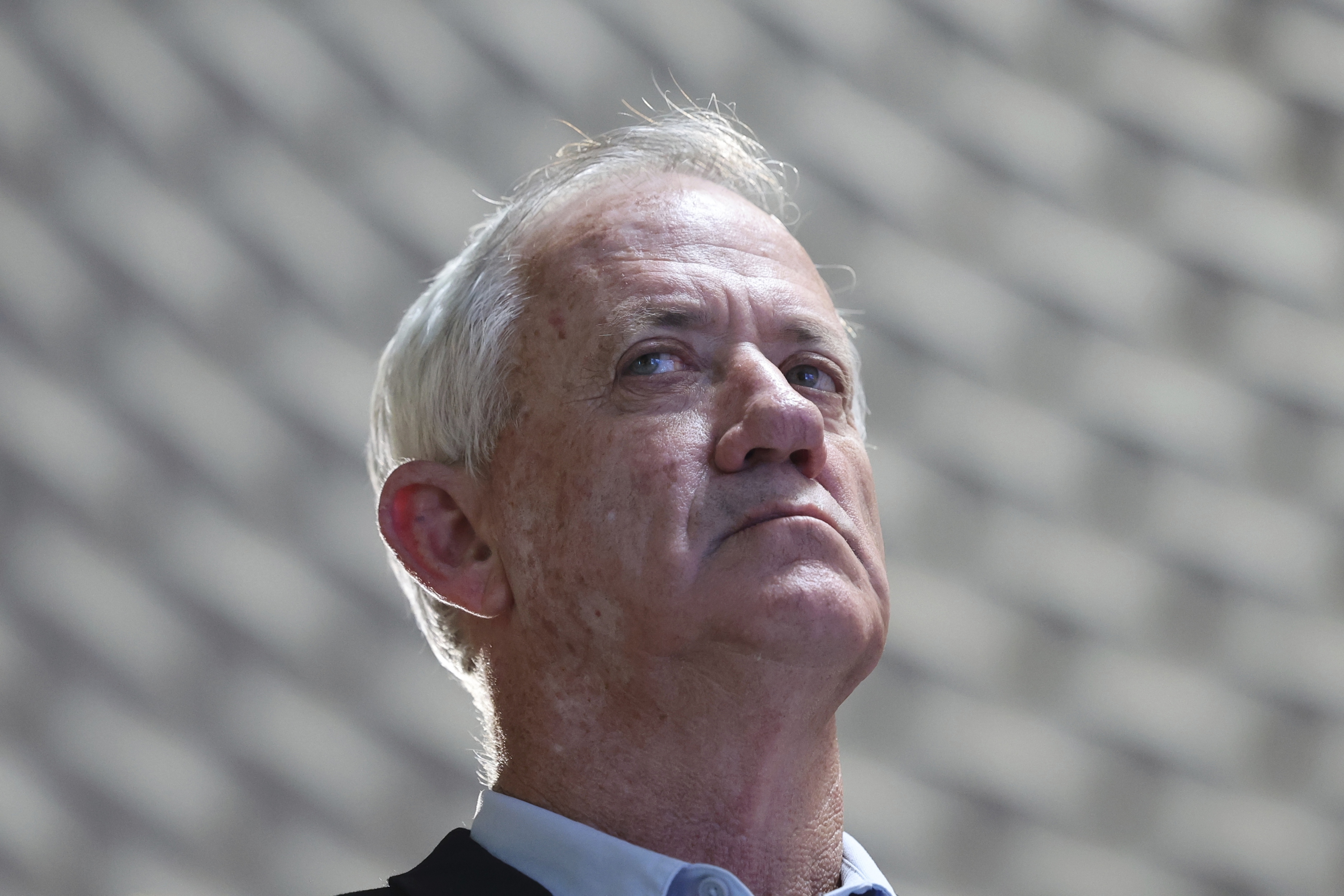 Benny Gantz attends a memorial ceremony for Israeli soldiers who fell in battle during the 2014 Gaza War, in the Hall of Remembrance at Mount Herzl Military Cemetery in Jerusalem on Tuesday, July 16, 2024.  (Abir Sultan/Pool Photo via AP)