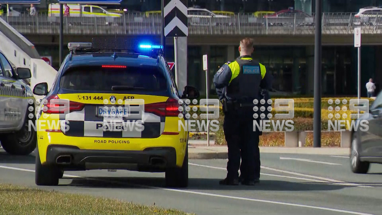 Police outside after the Canberra Airport shooting.