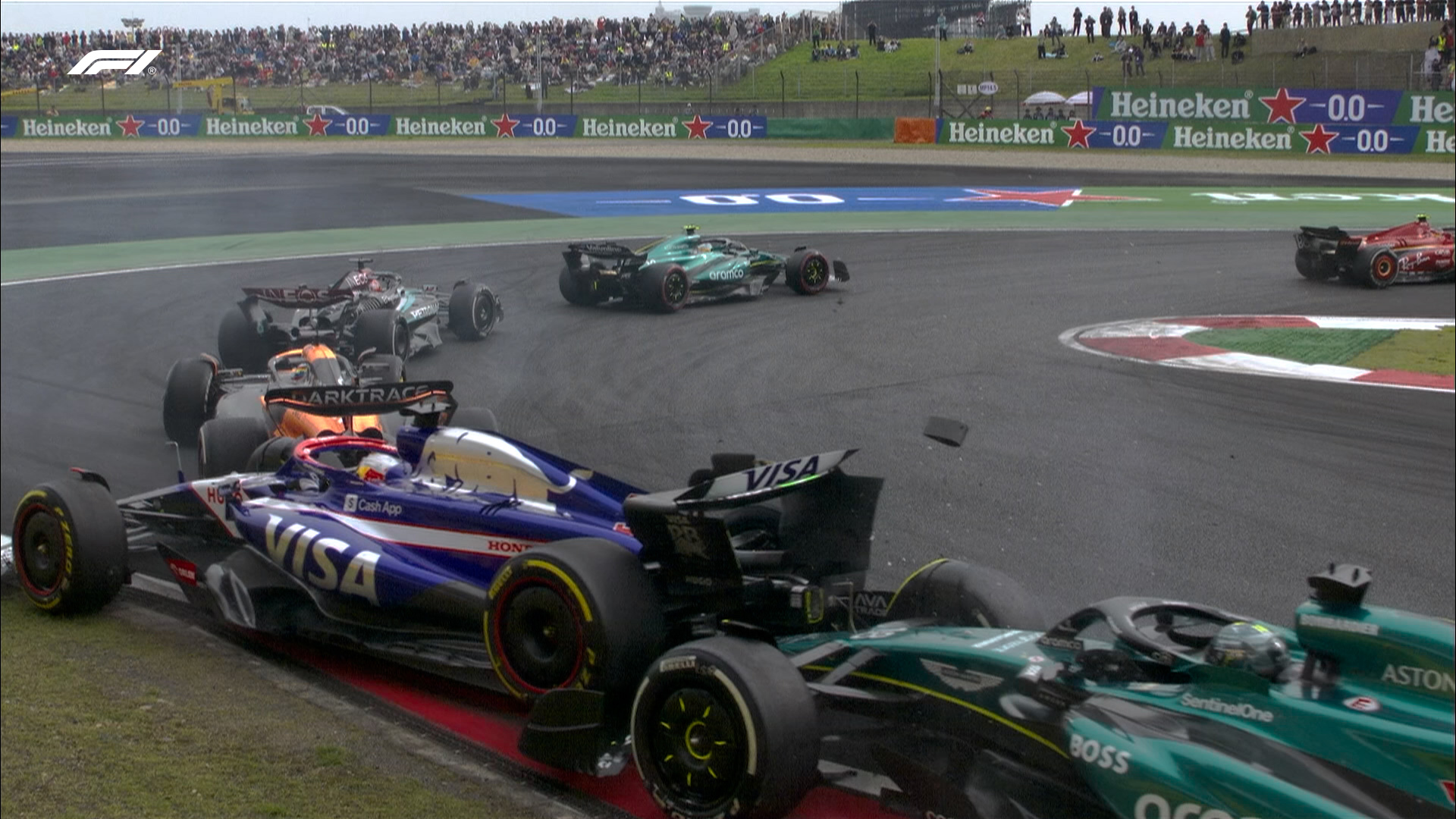 Daniel Ricciardo is hit by Lance Stroll under safety car conditions in the Chinese Grand Prix.