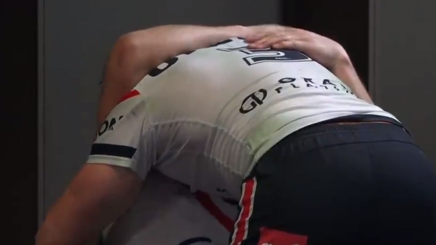 Josh Morris comforts brother Brett after a potentially career-ending injury. 