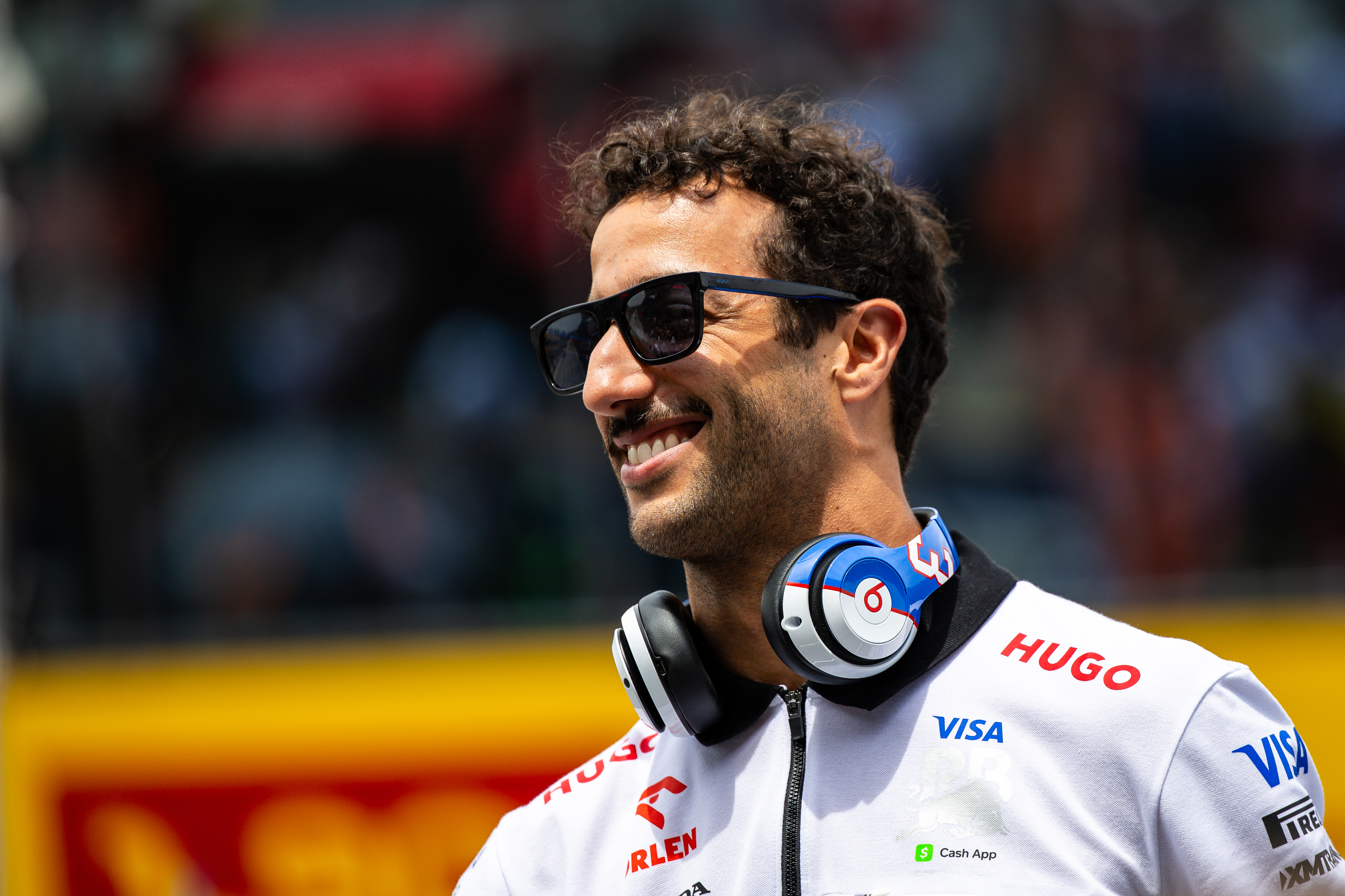 Daniel Ricciardo of Australia and Visa Cash App RB looks on during the drivers' parade ahead of the F1 Grand Prix of Austria at Red Bull Ring on June 30, 2024 in Spielberg, Austria. (Photo by Jayce Illman/Getty Images)